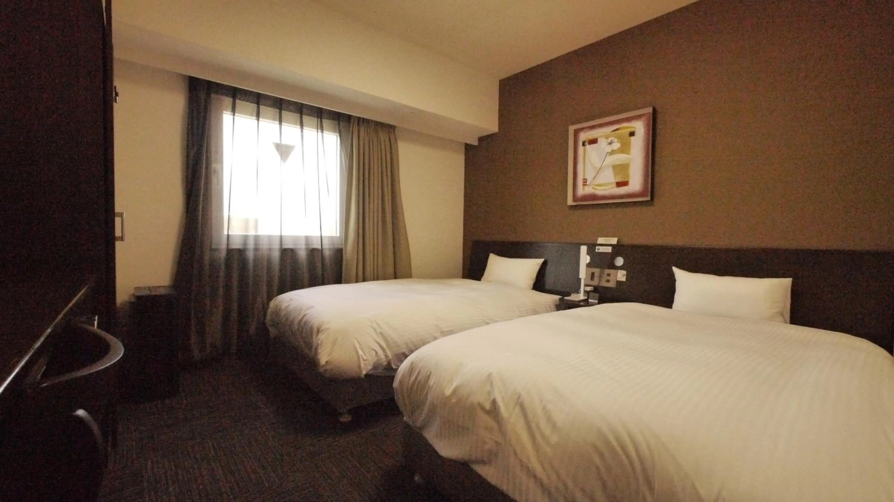 Photo of the whole room, Bed in Hotel Route-Inn Tsuruga Ekimae