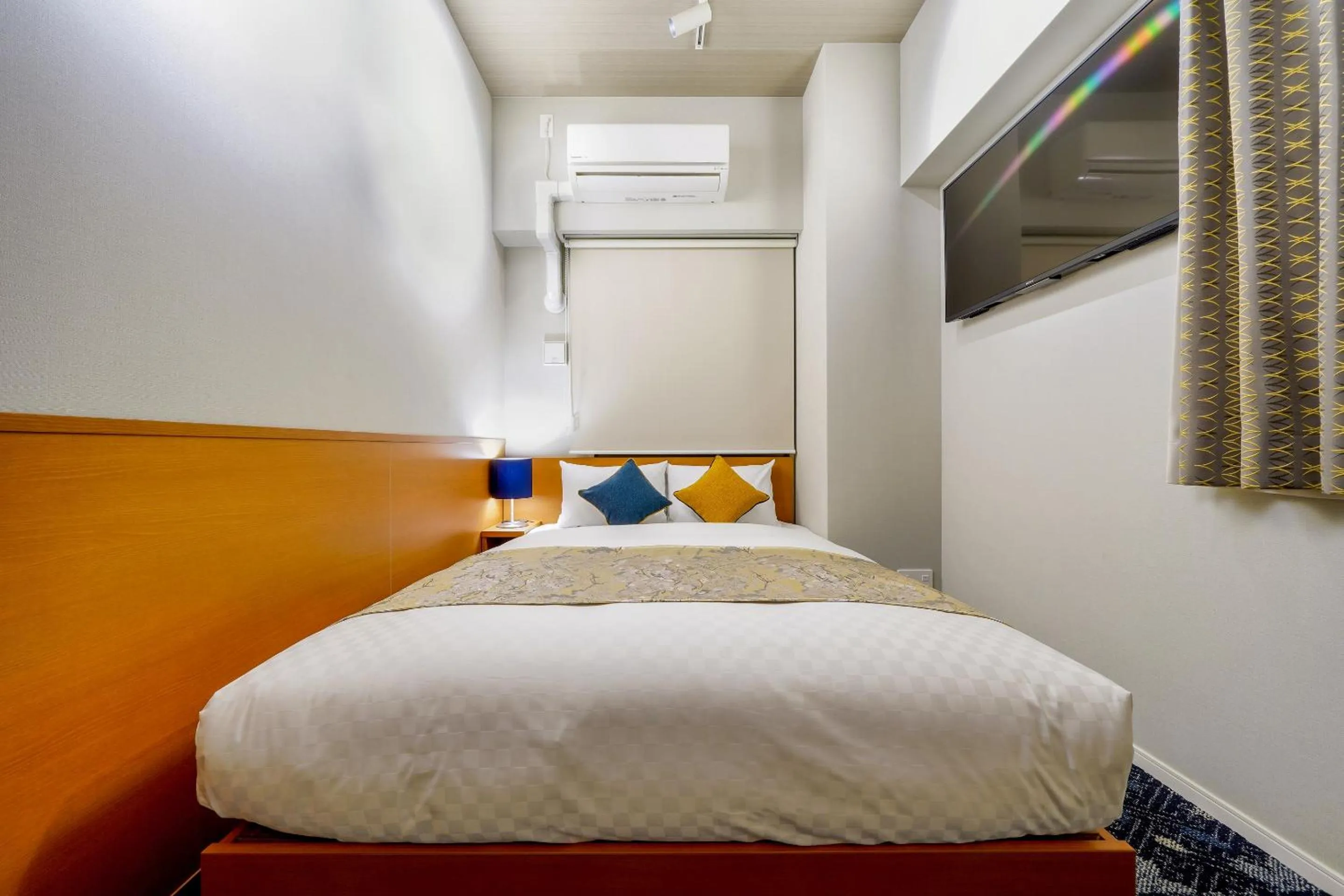 Bed in RESI STAY THE KYOTO