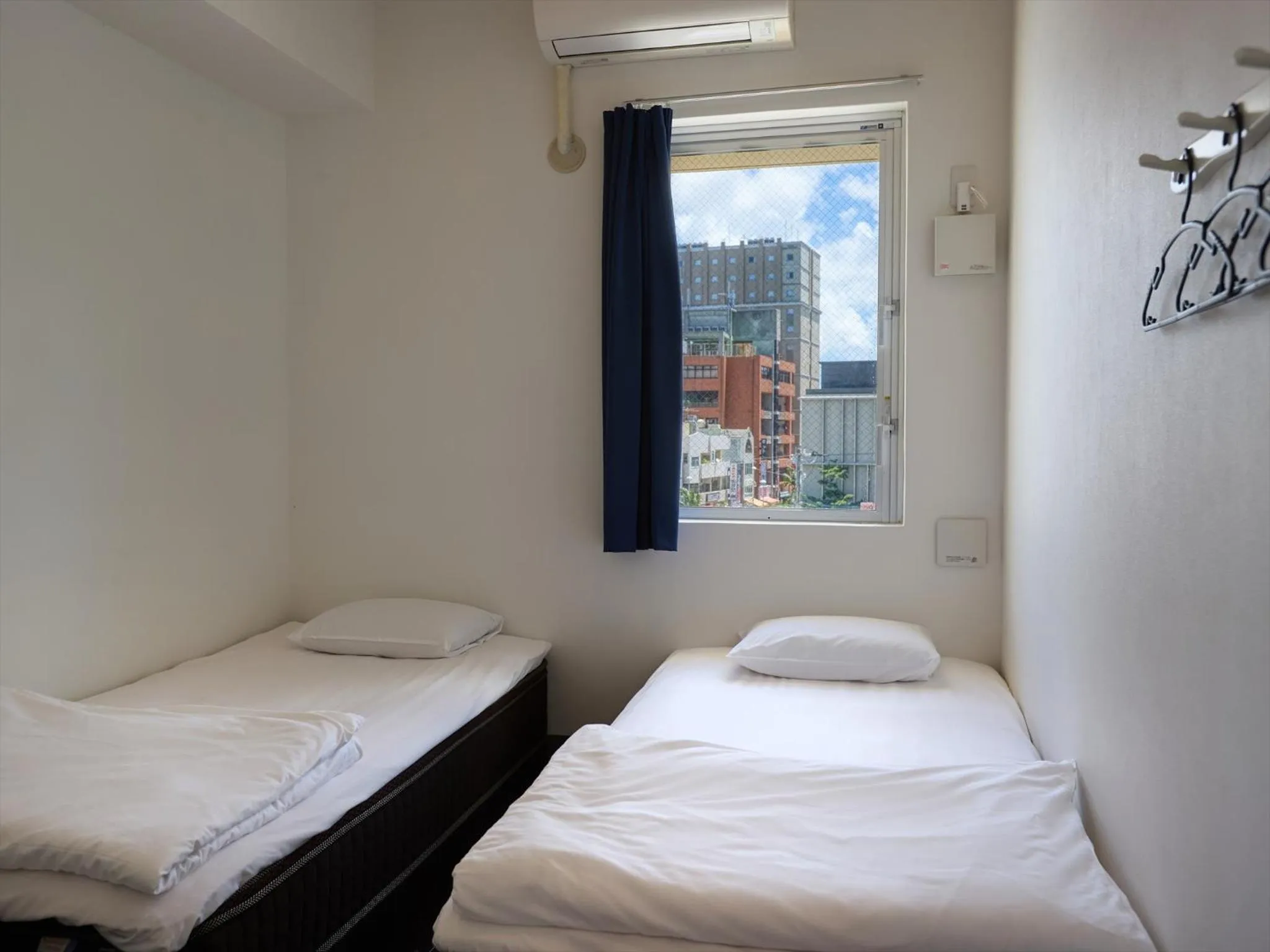 Bed in Chura Cabin Kokusai-Dori