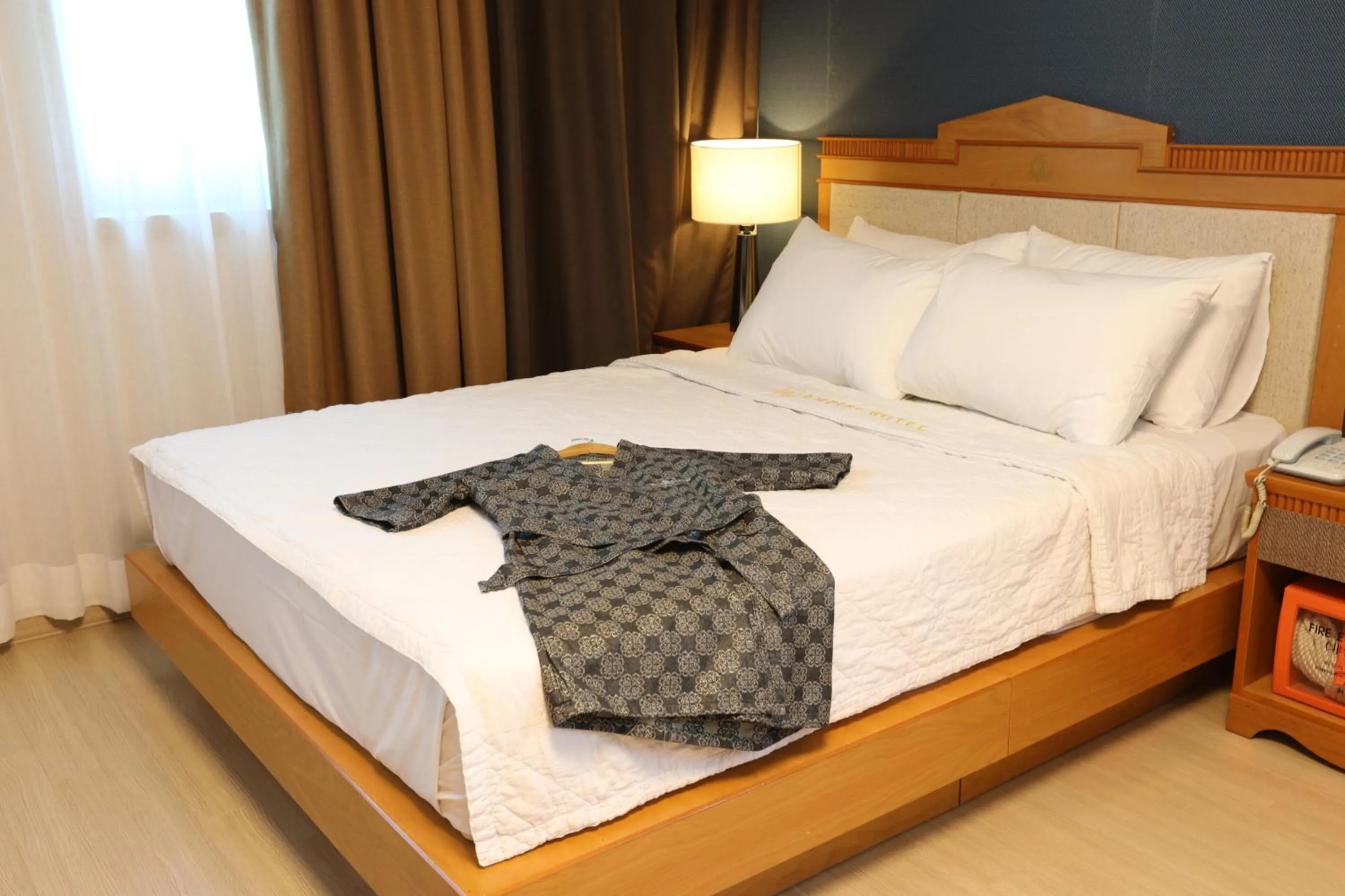 Bed in Gwangju Empire Hotel