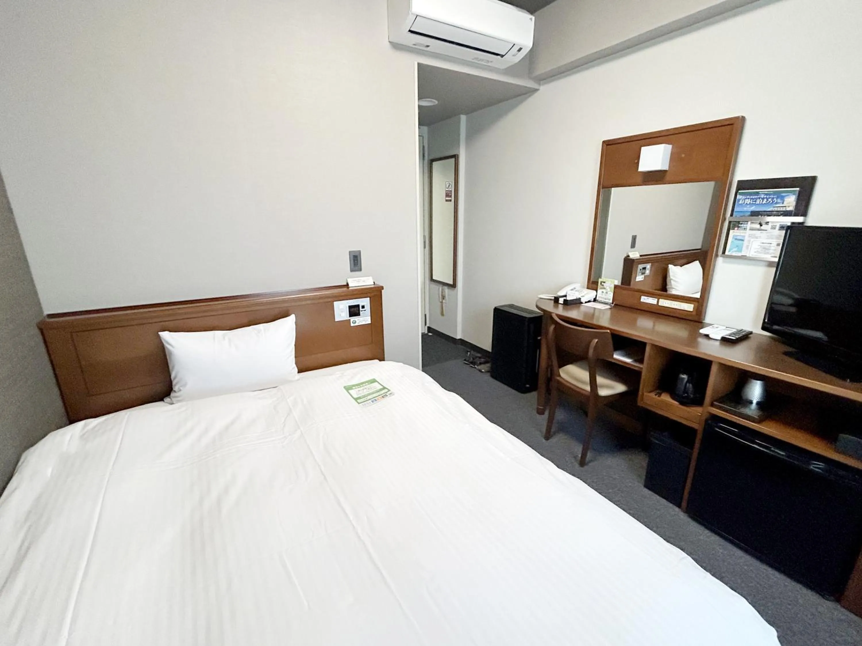 Photo of the whole room, Bed in Hotel Route-Inn Iwata Inter