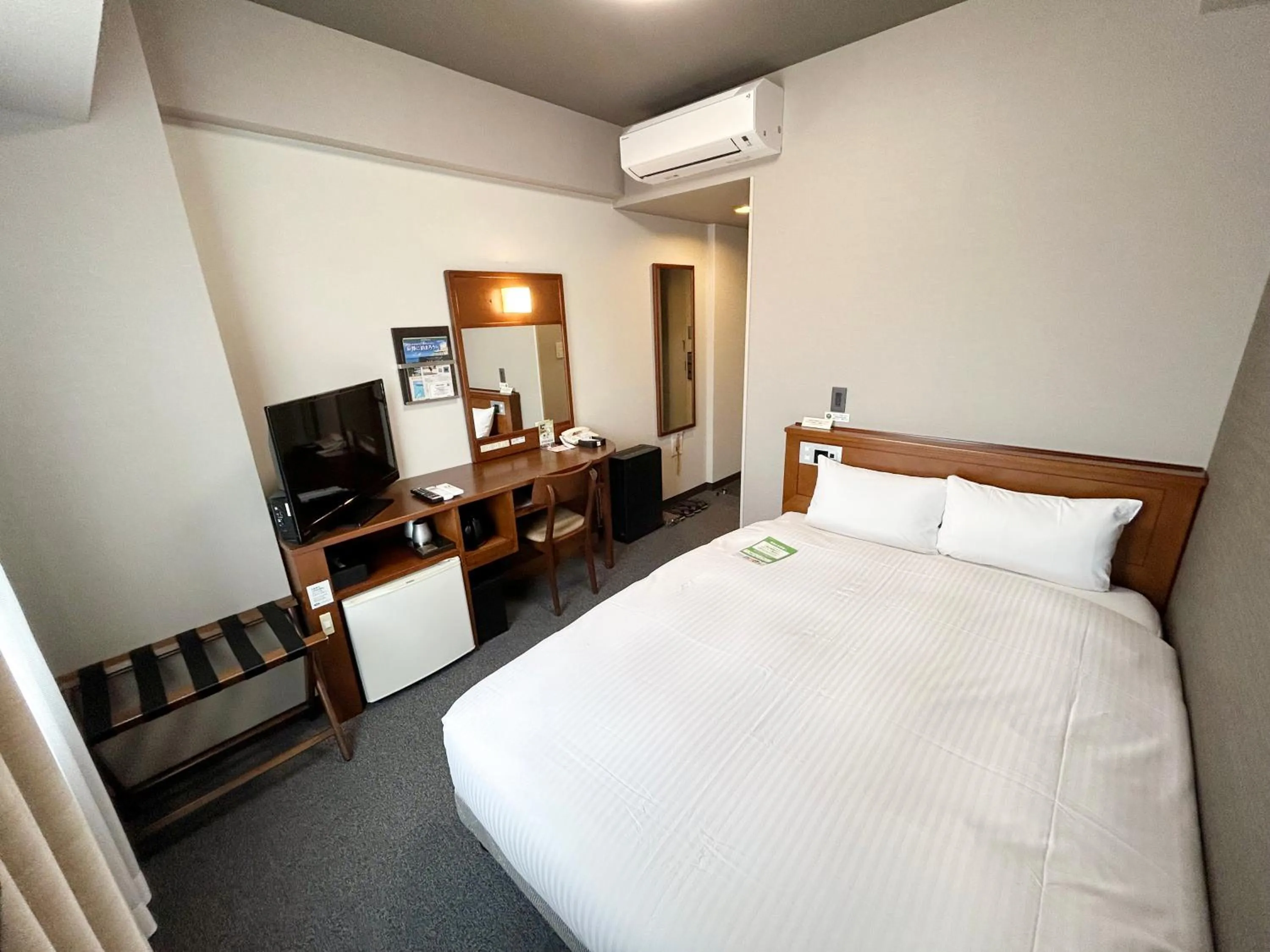 Photo of the whole room, Bed in Hotel Route-Inn Iwata Inter