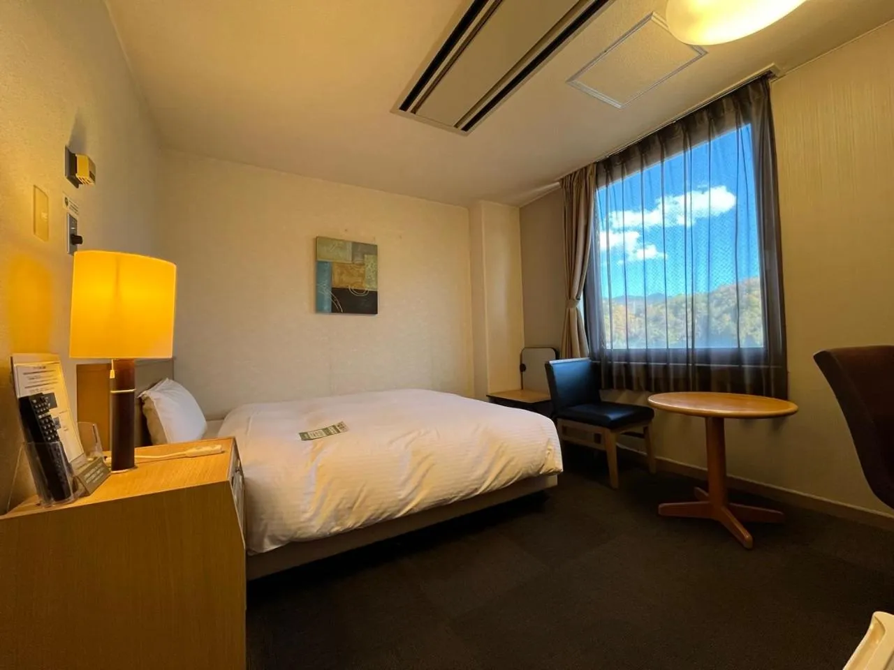 Photo of the whole room, Bed in Hotel Route-Inn Seibu Chichibu Ekimae