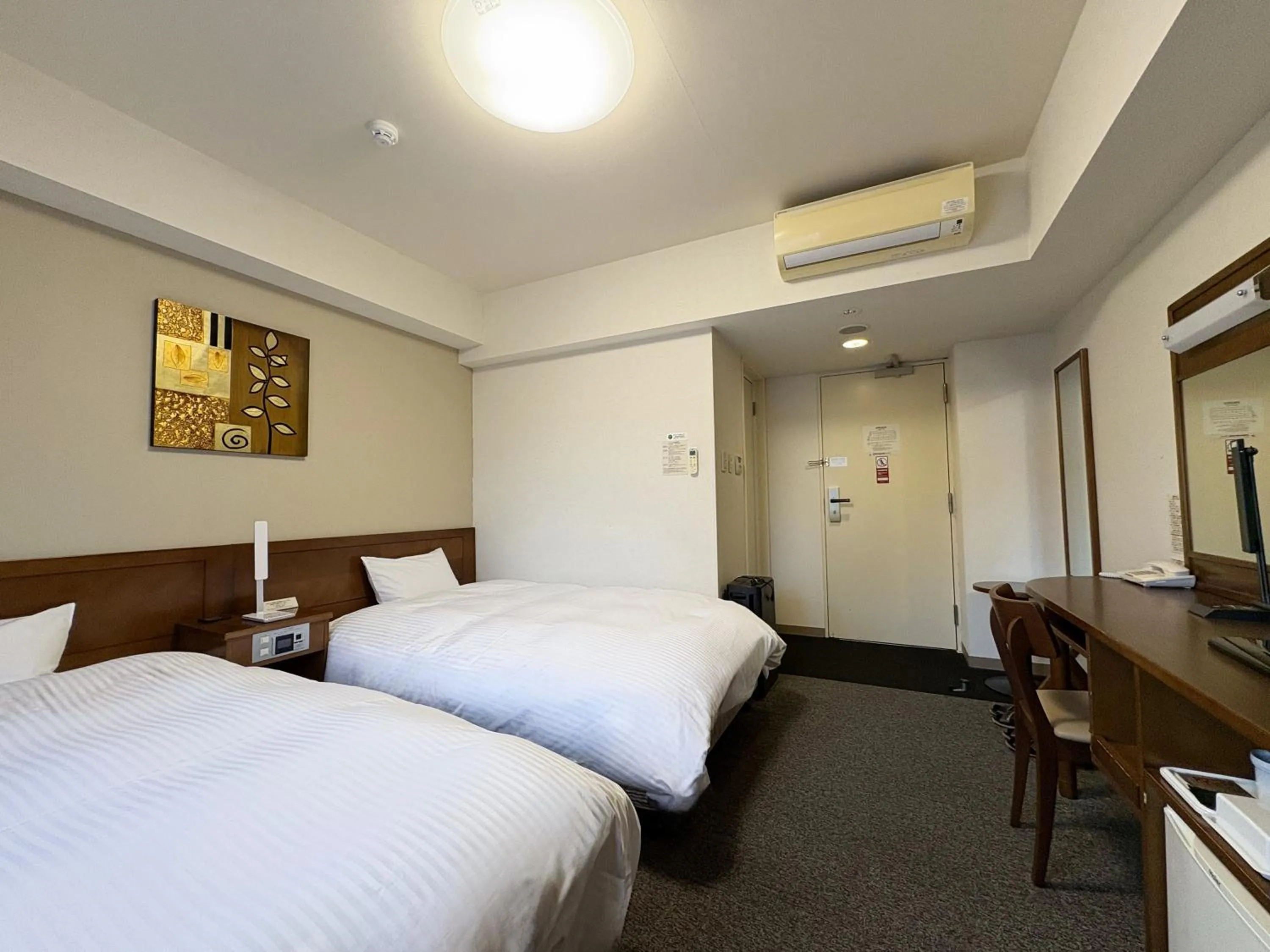Photo of the whole room, Bed in Hotel Route-Inn Iwaki Ekimae