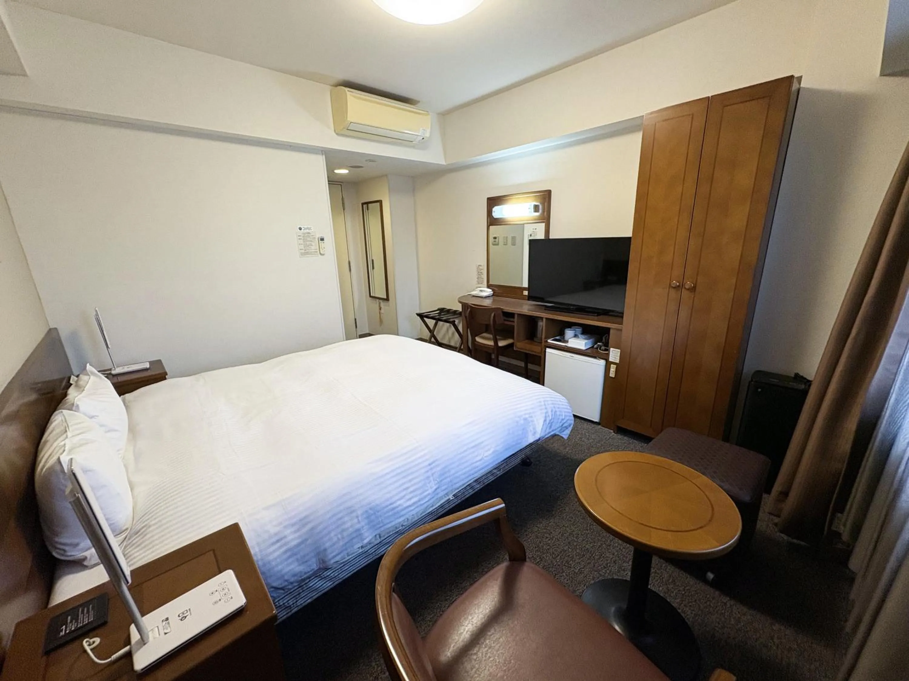 Photo of the whole room, Bed in Hotel Route-Inn Iwaki Ekimae