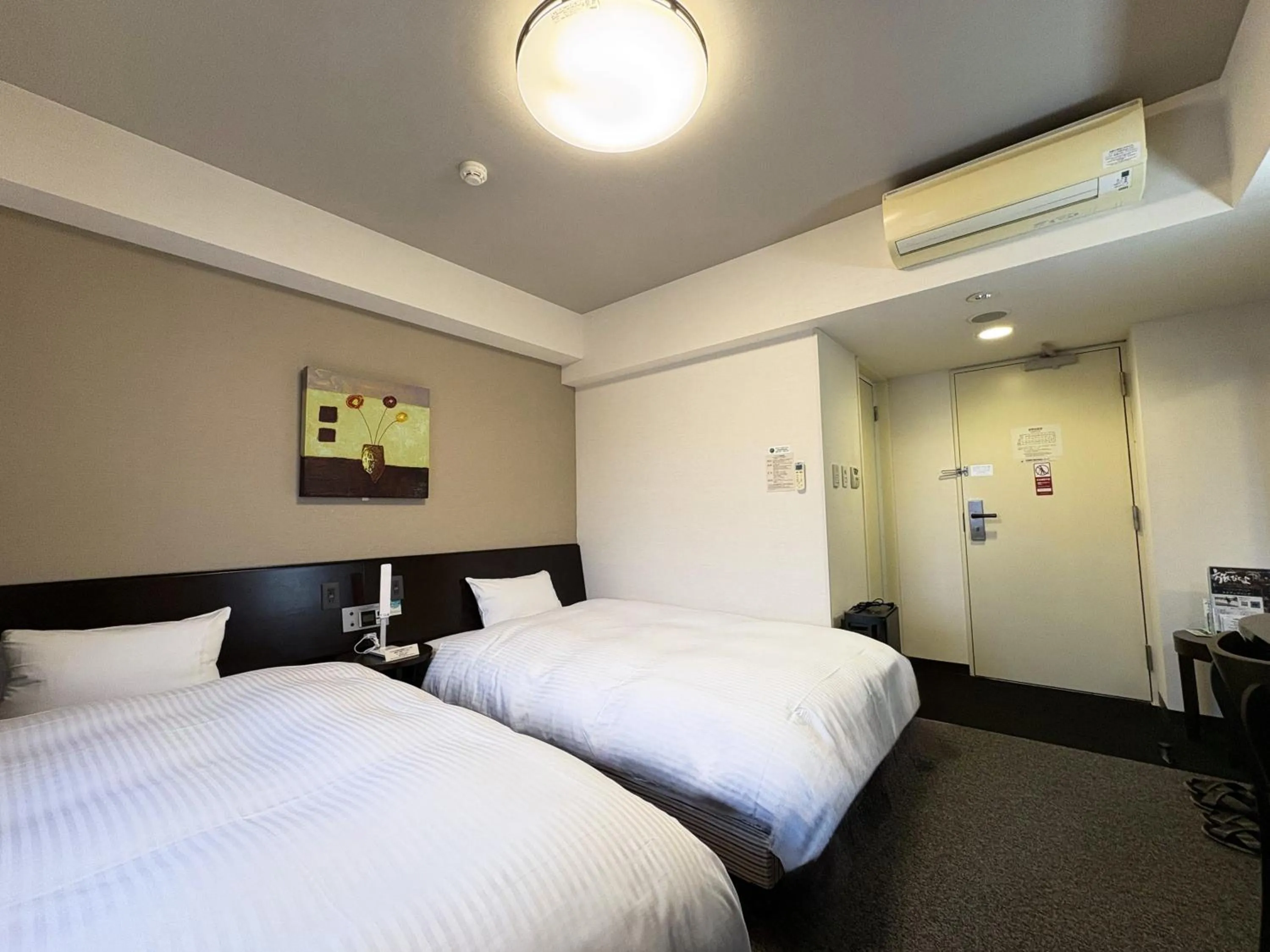 Photo of the whole room, Bed in Hotel Route-Inn Iwaki Ekimae