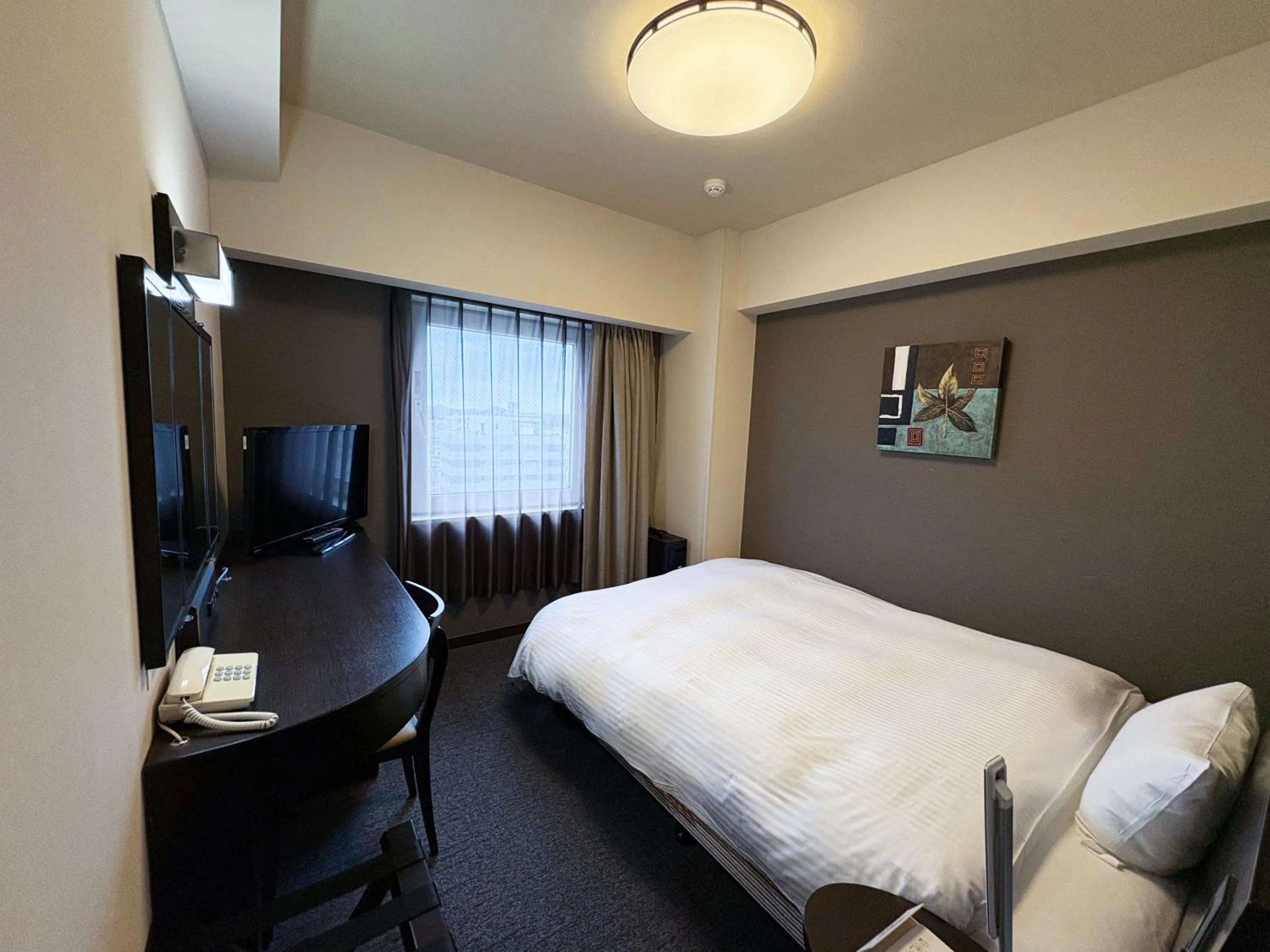 Photo of the whole room, Bed in Hotel Route-Inn Iwaki Ekimae