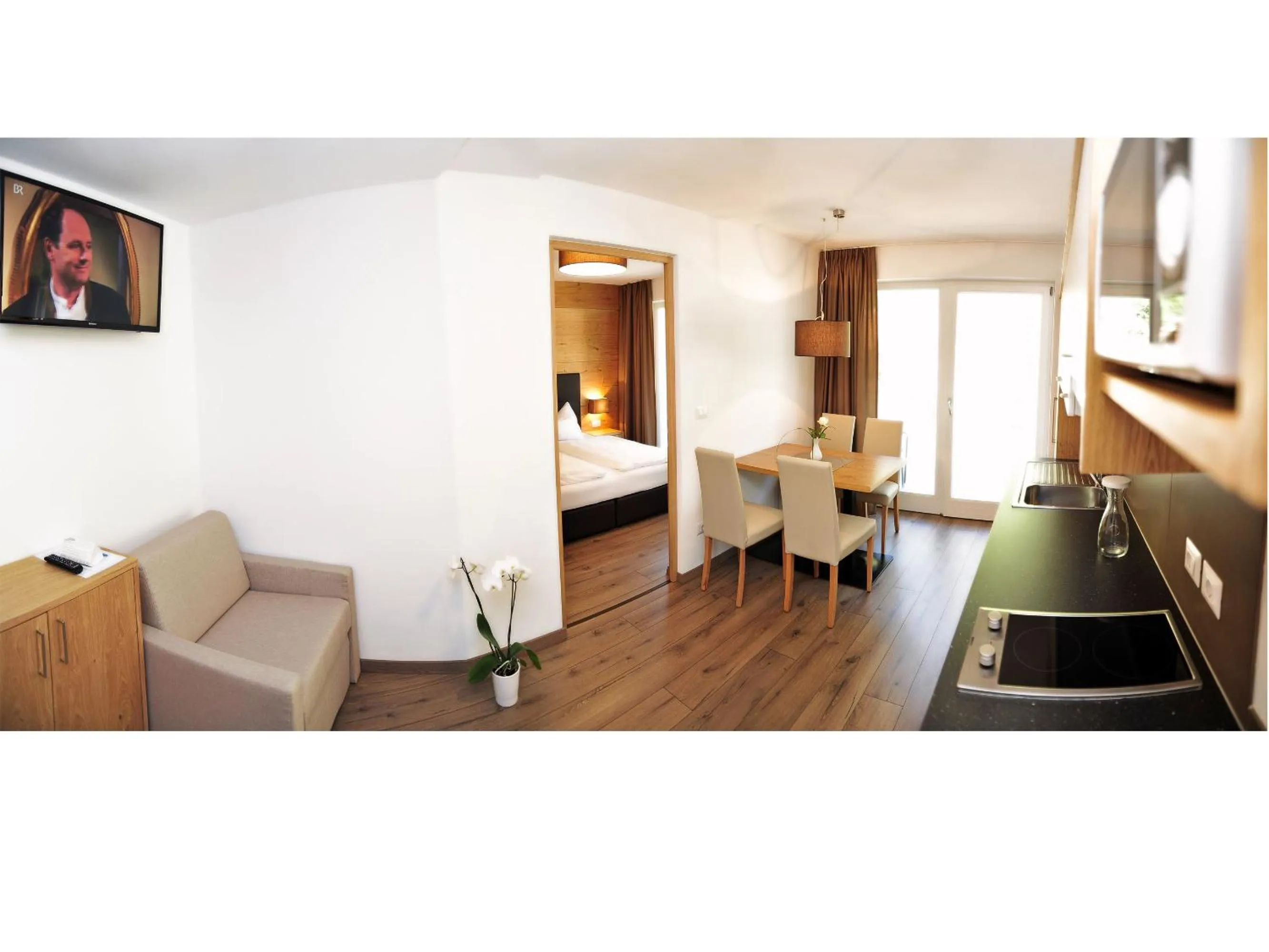 Kitchen or kitchenette, Bed in Apparthotel Central