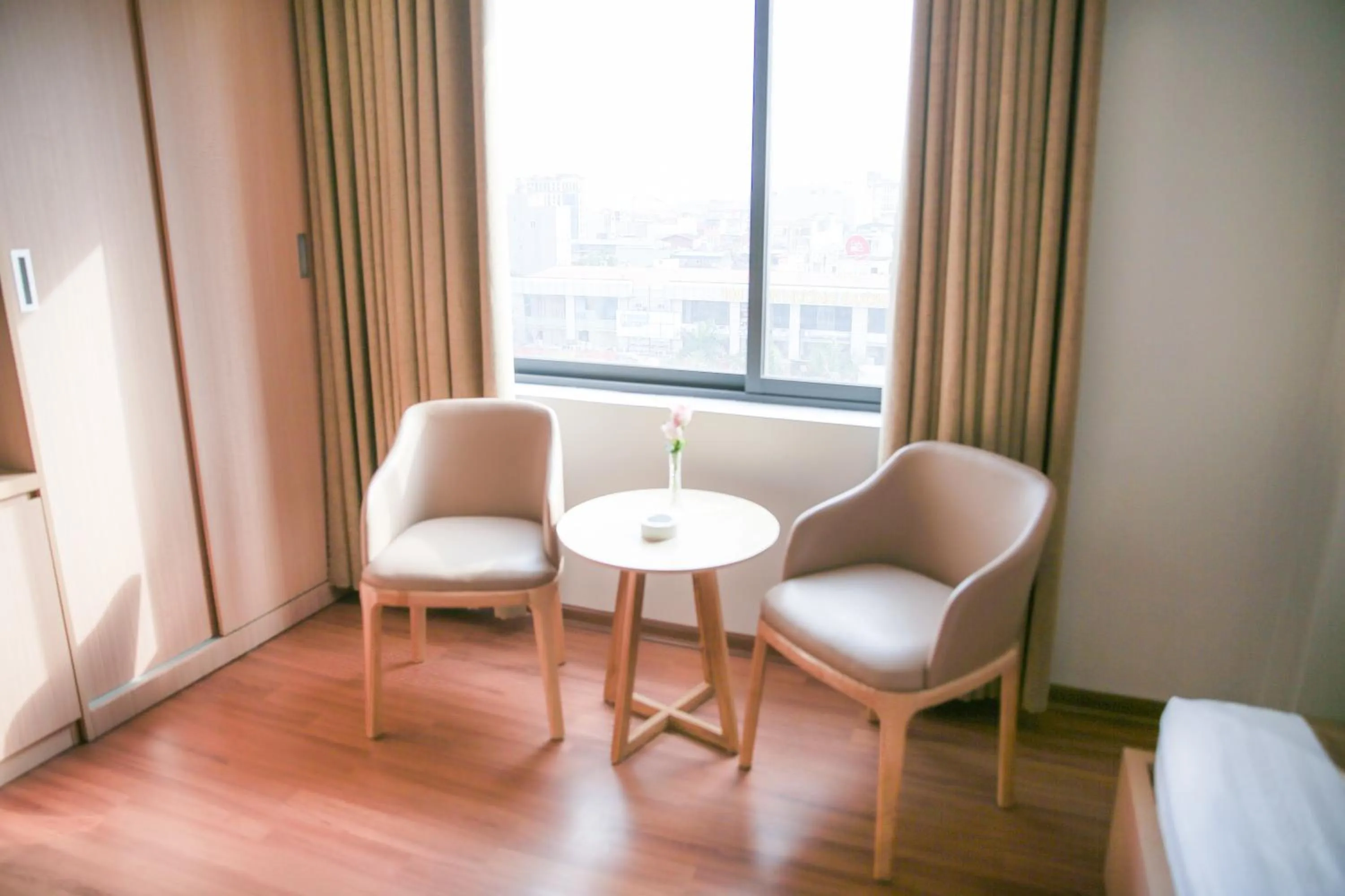 Seating area in Long Anh Hotel