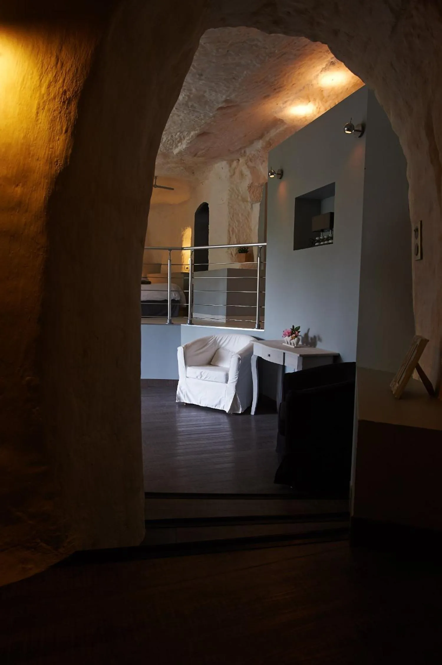 Seating area in Logis Hôtels Troglododo