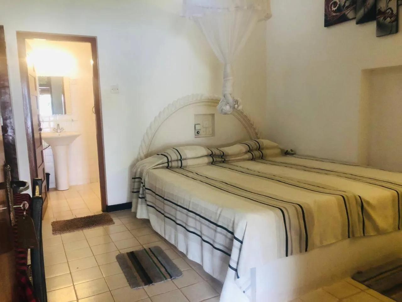 Bed in Hotel Hemadan