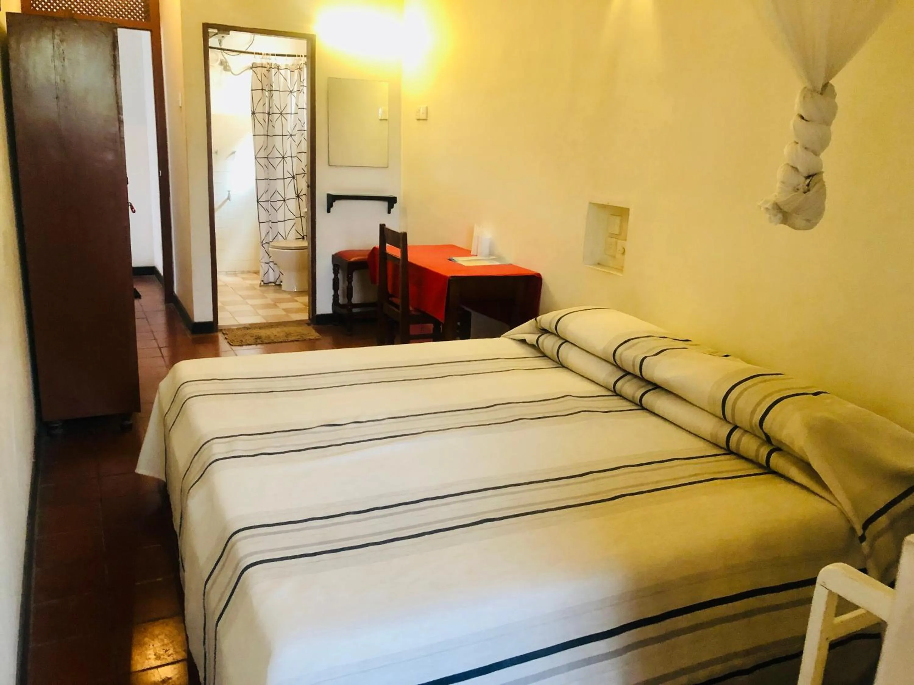 Bed in Hotel Hemadan