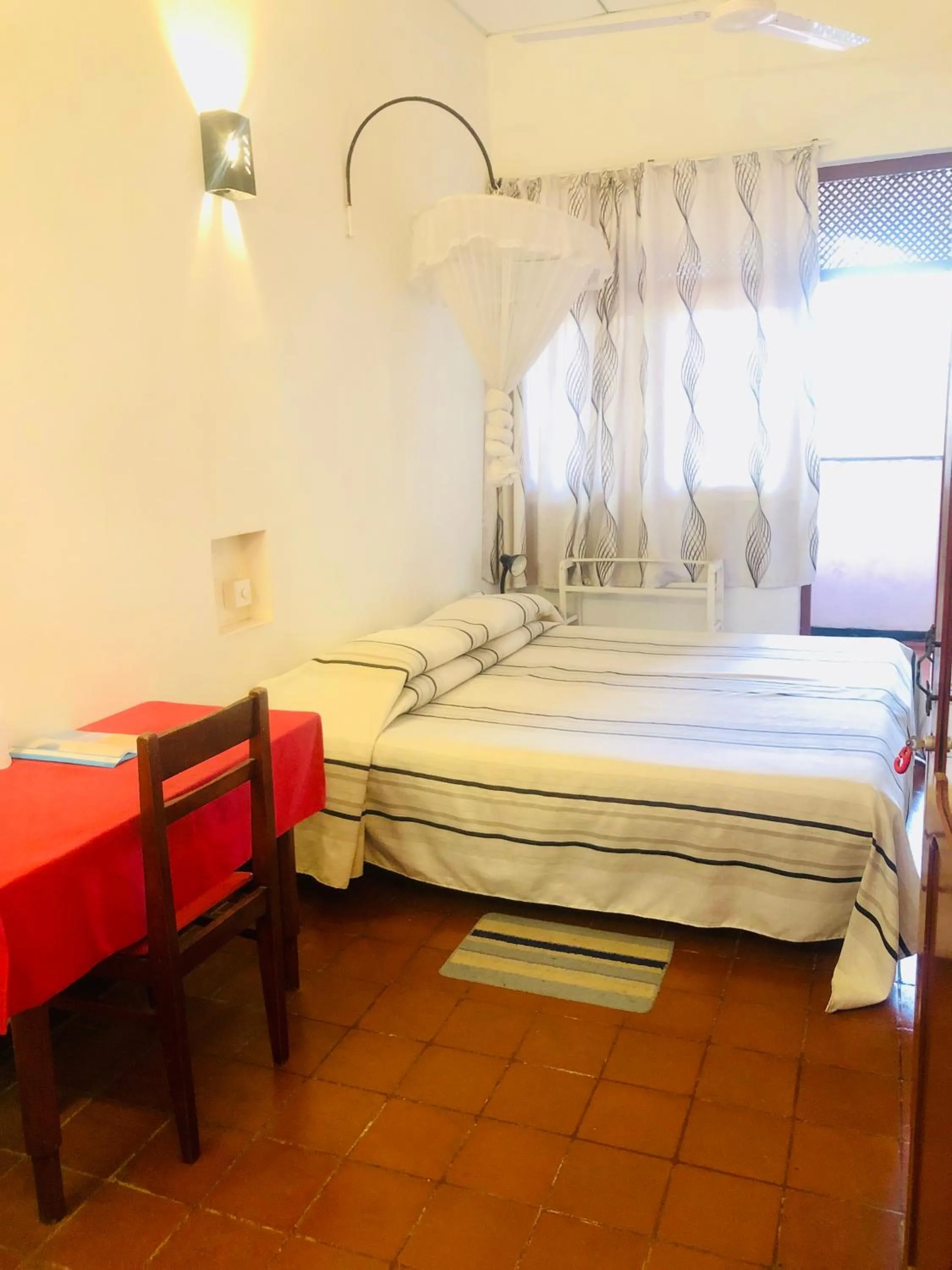 Bed in Hotel Hemadan