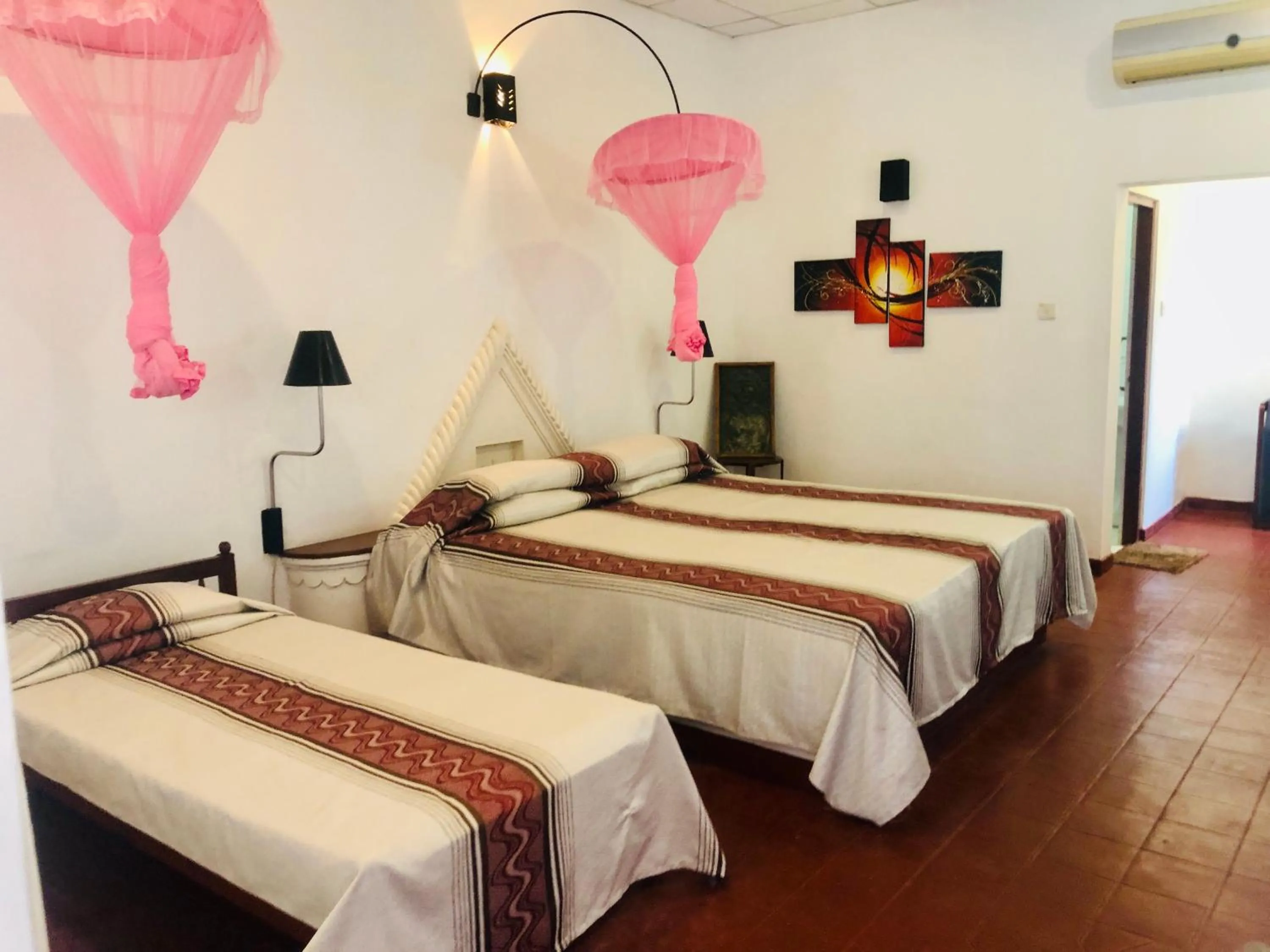 Bed in Hotel Hemadan