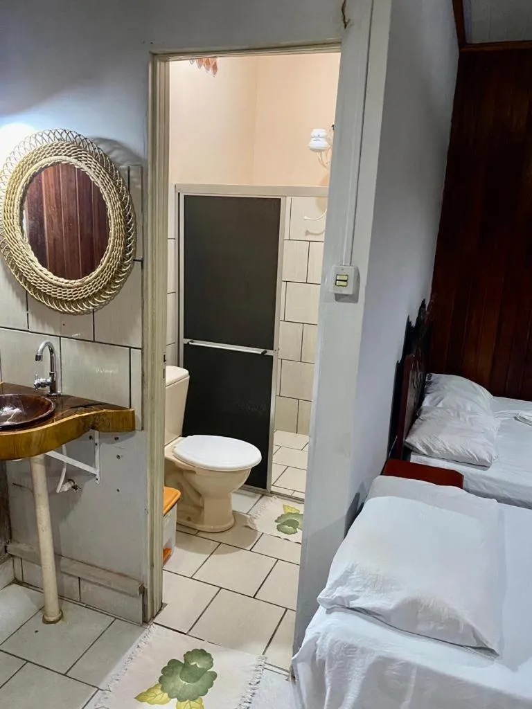 Bed in Pousada Encantos da Amazônia