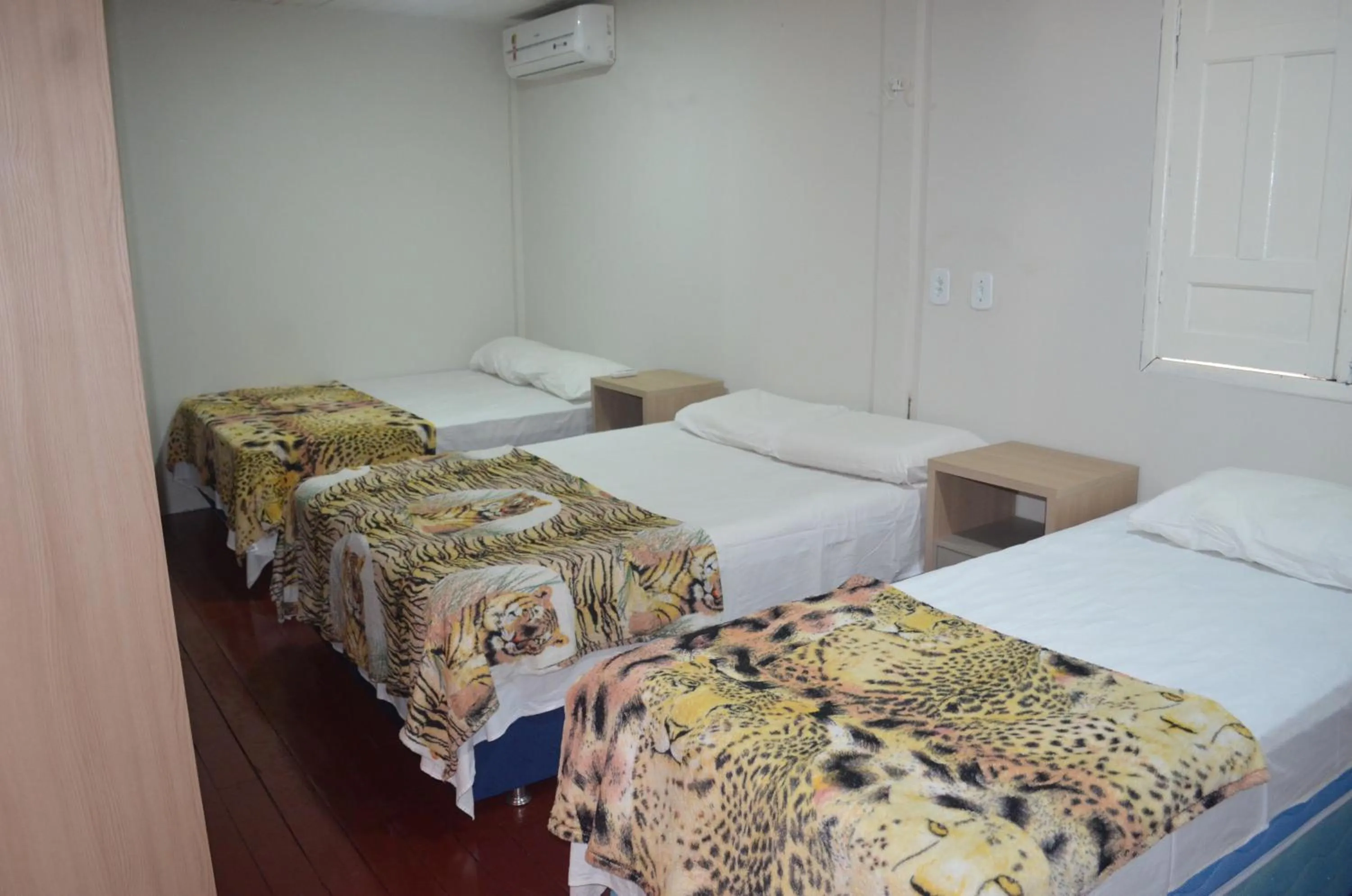 Bed in Pousada Encantos da Amazônia