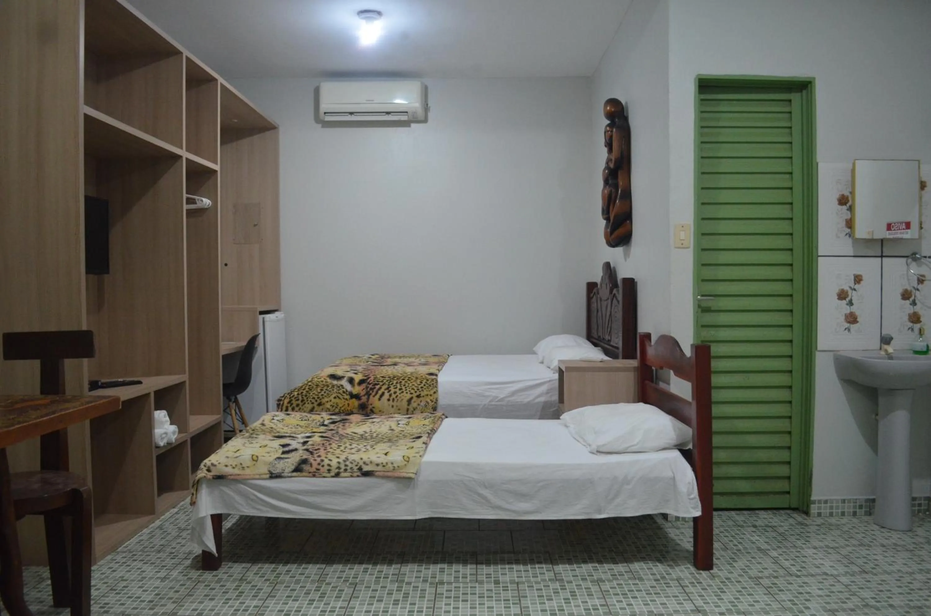 Bed in Pousada Encantos da Amazônia