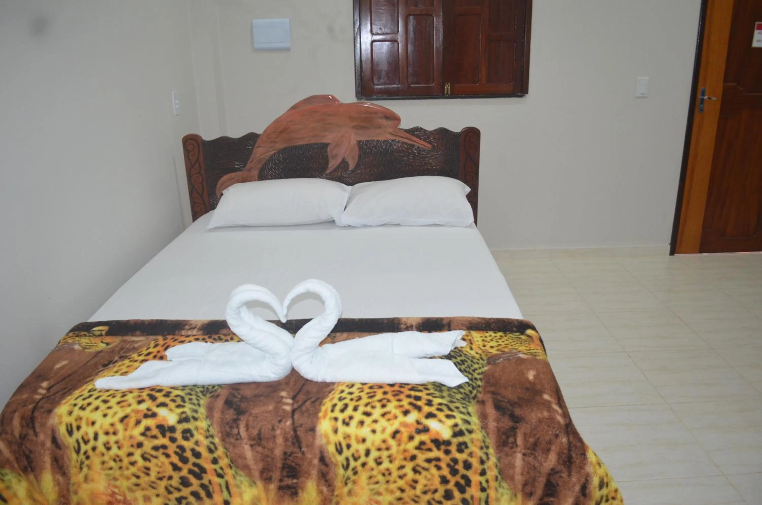 Bed in Pousada Encantos da Amazônia