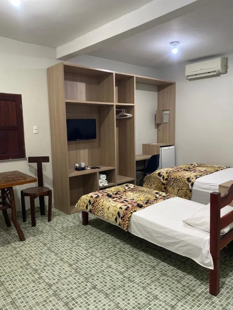 Bed in Pousada Encantos da Amazônia