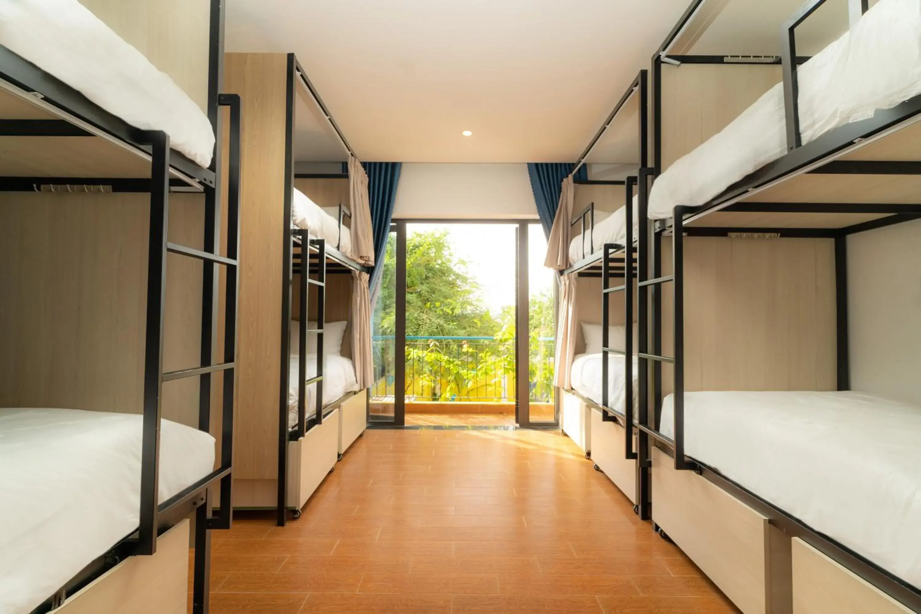 Bed in 8-Bed Dormitory Room in The Cuckoo's Nest Hostel and Bar managed by Hoianese Bed in 8-Bed Dormitory Room in The Cuckoo's Nest Hostel and Bar managed by Hoianese