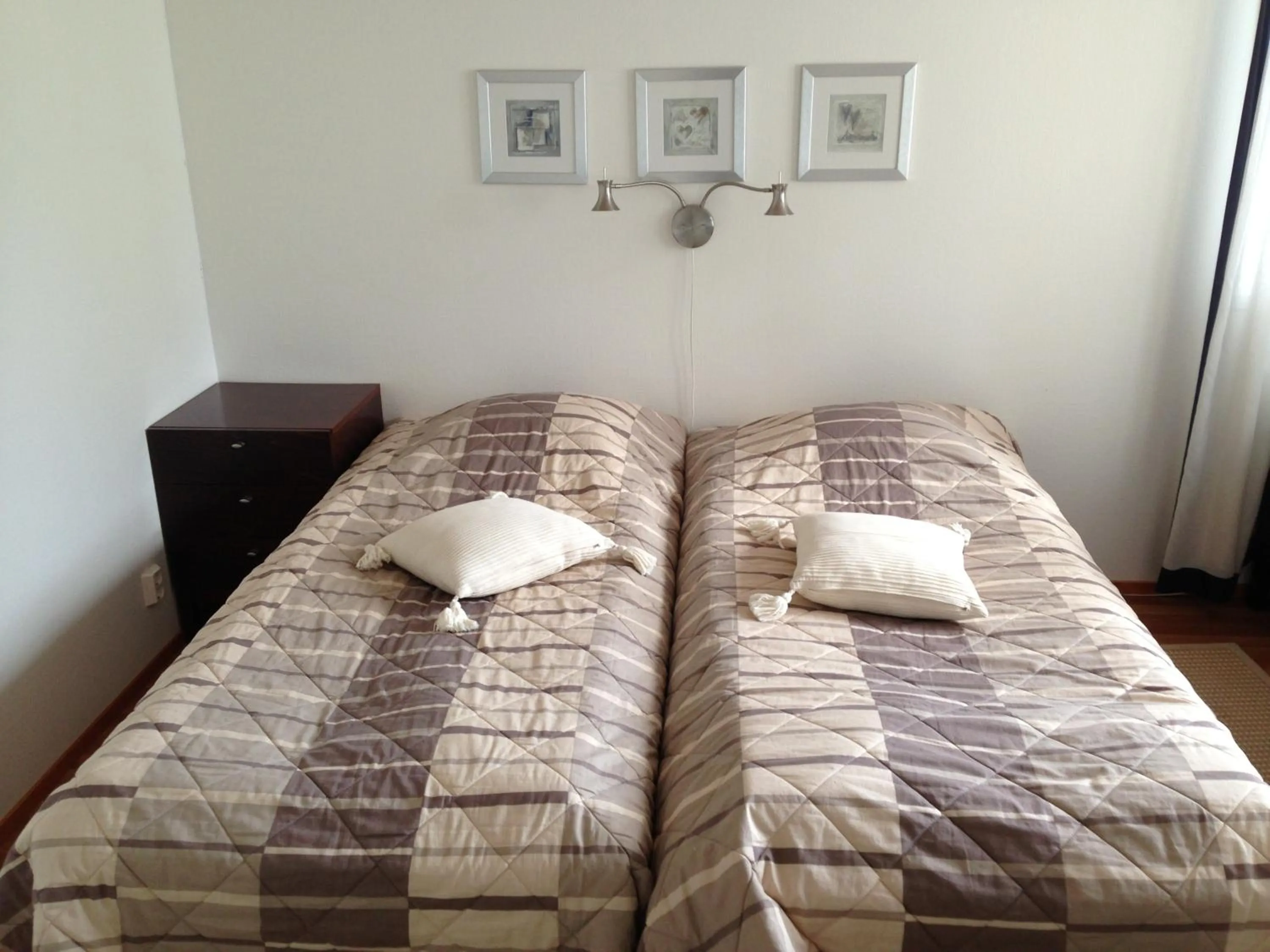 Bed in Huoneistohotelli Lumihovi