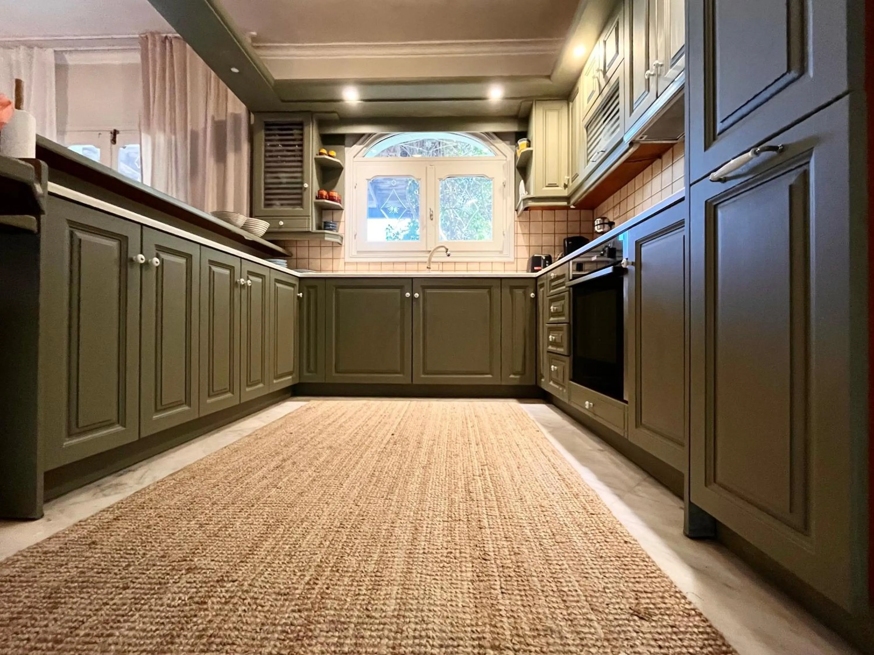 kitchen in Pantheon Apartments & Studios