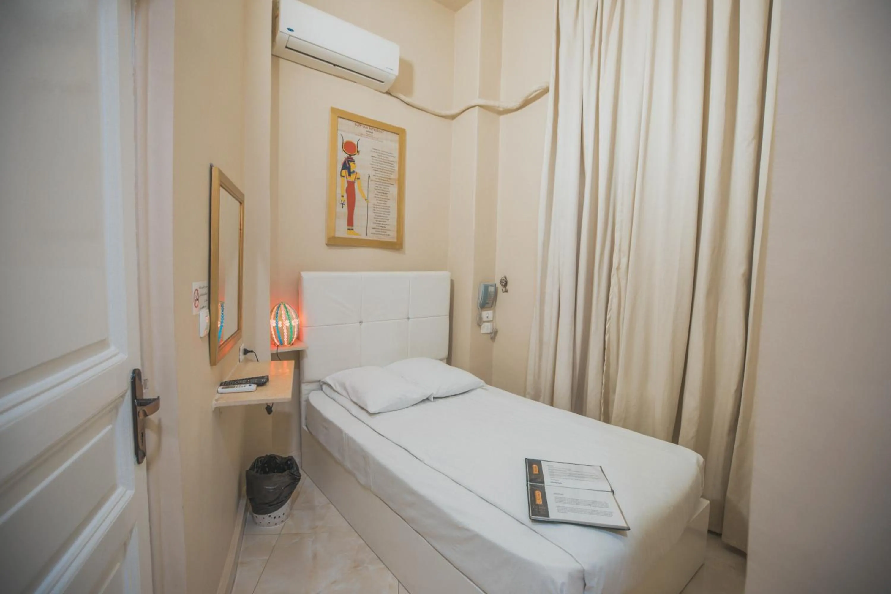 Bed in Tahrir Plaza Suites - Museum View