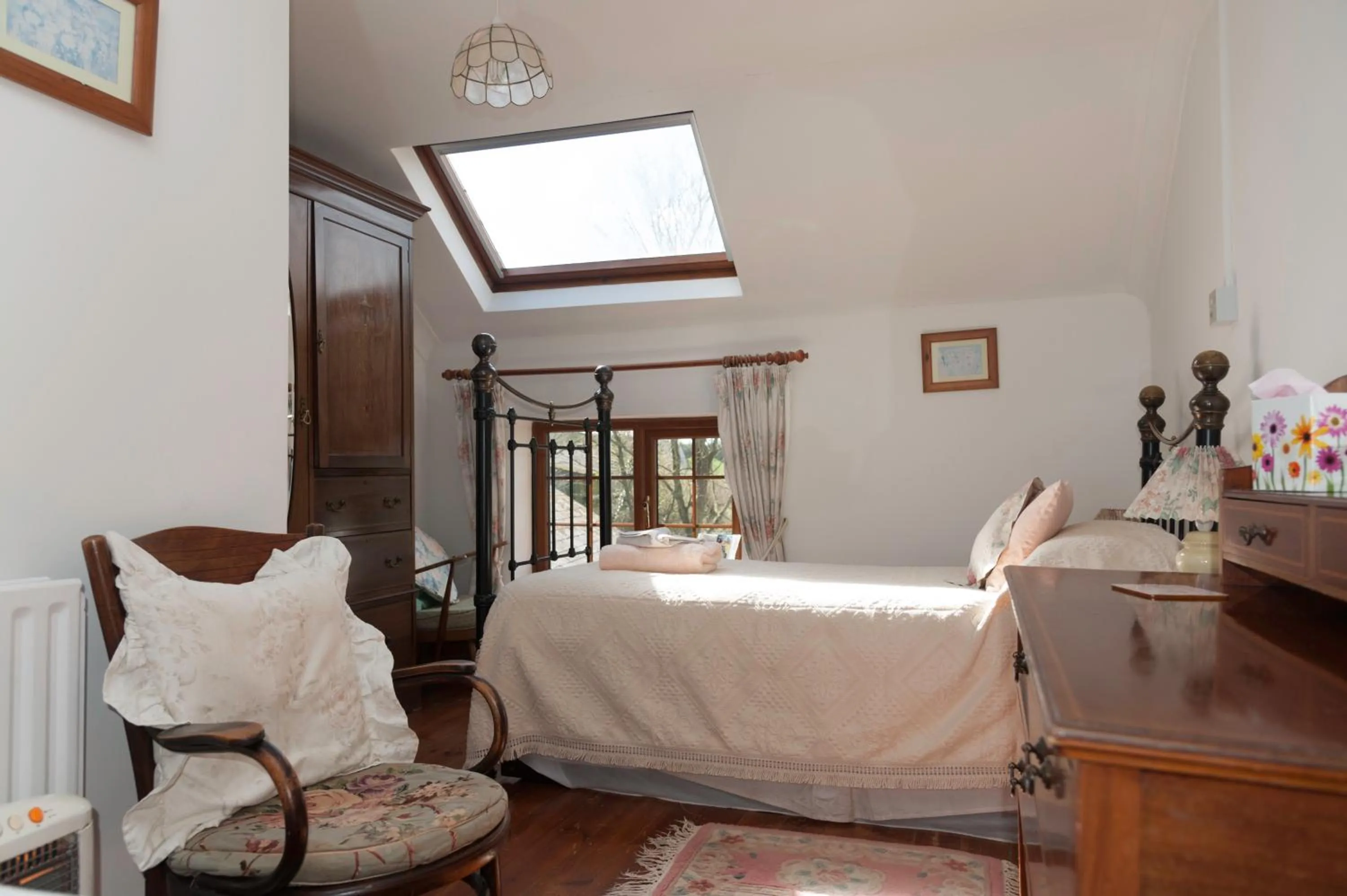 Bed in Burton Farmhouse