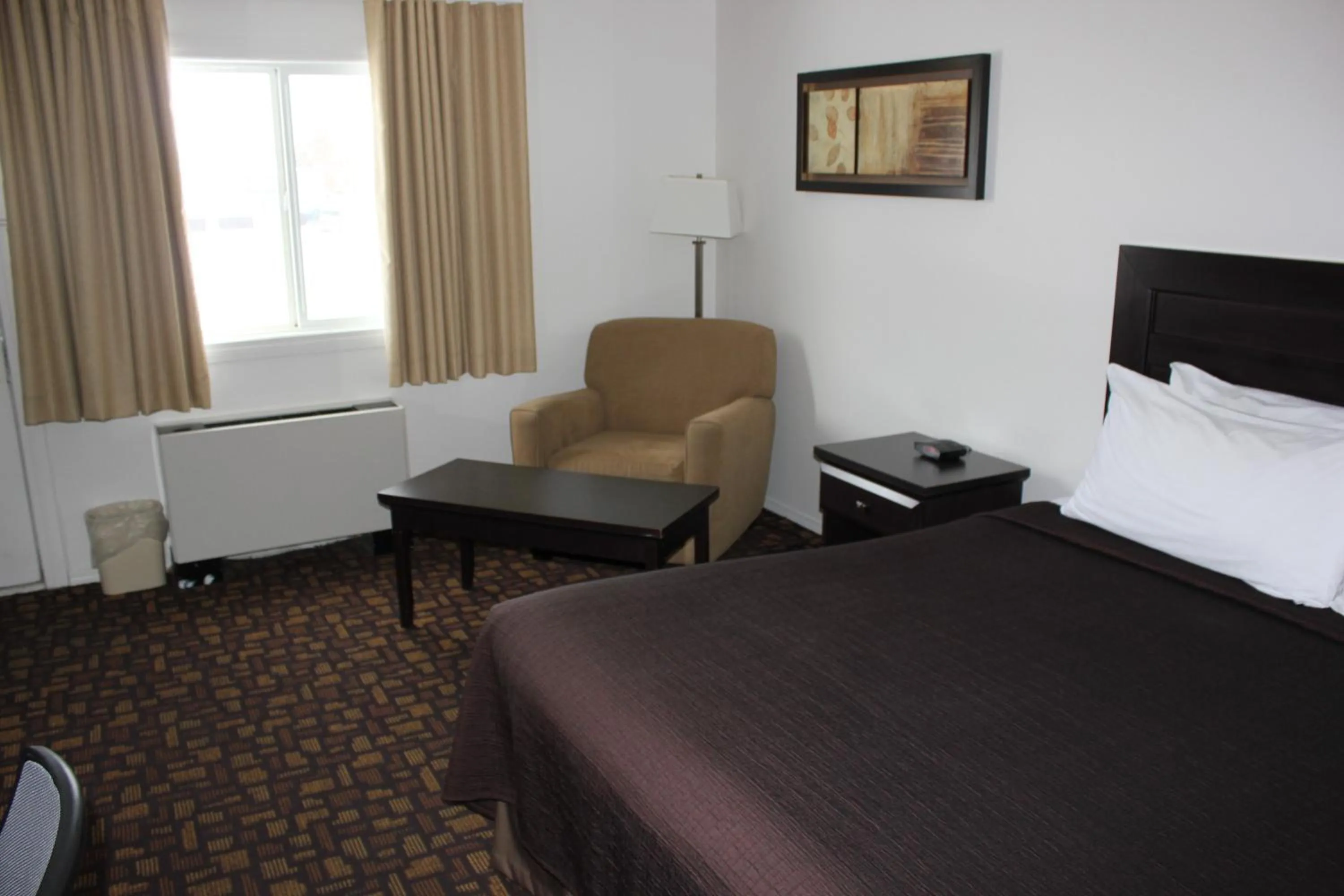 Bed in Coronet Hotel