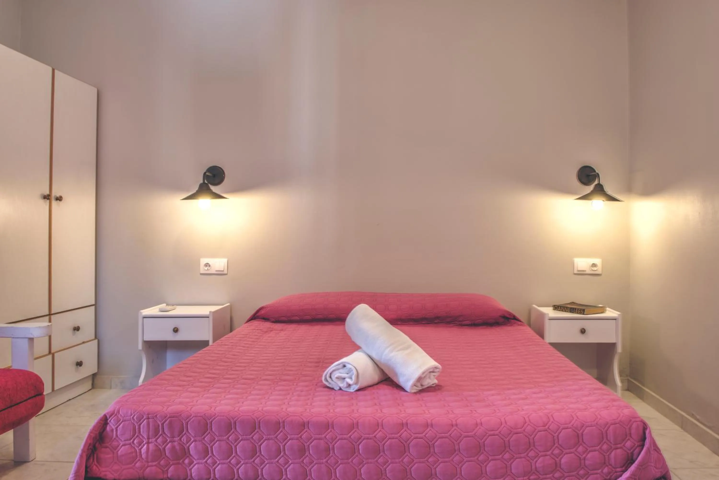 Bed in The Palm Garden - Idyllic Pool Apartments in a Green Oasis