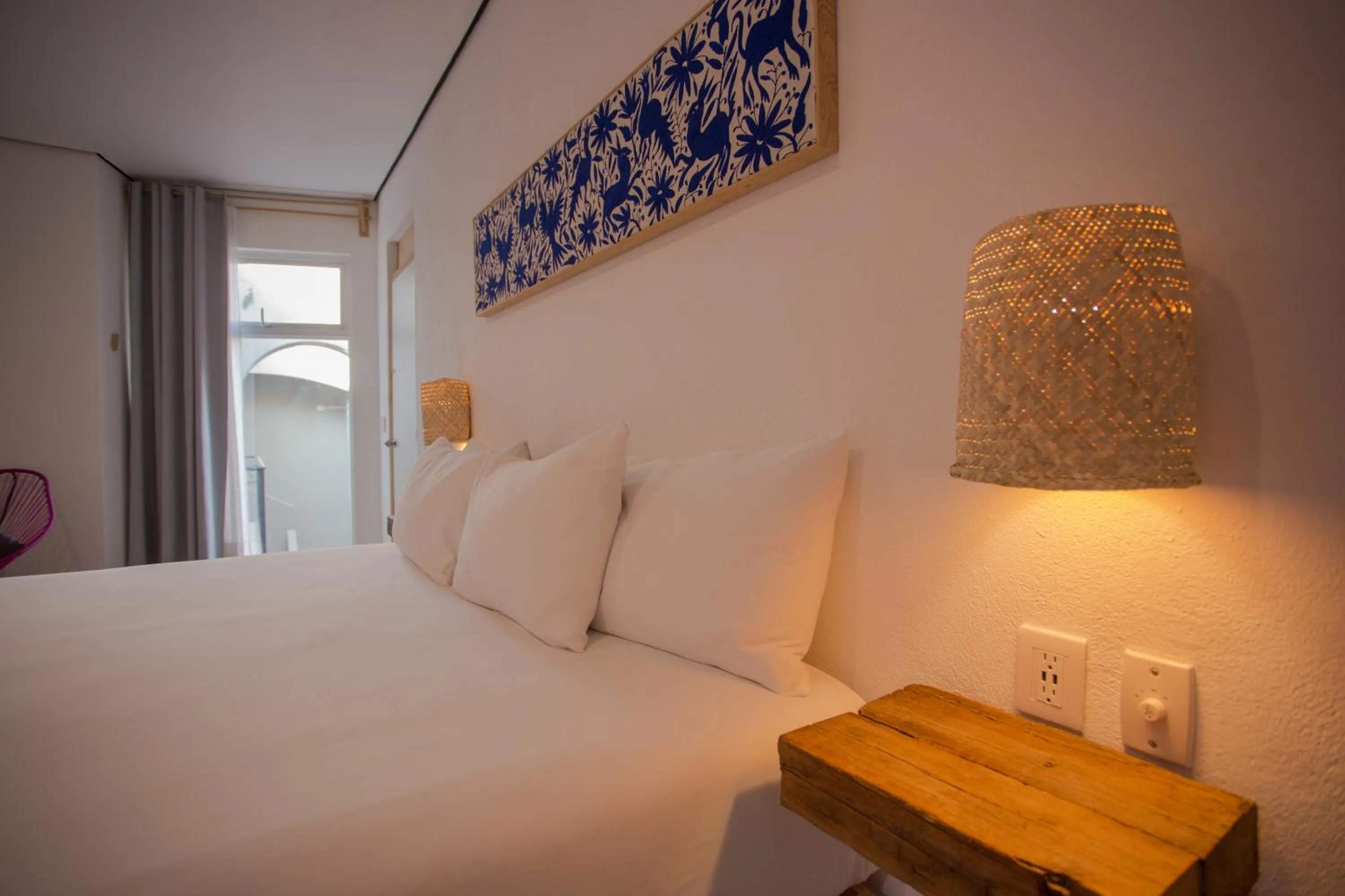 Bed in Hotel Mamá Carlota