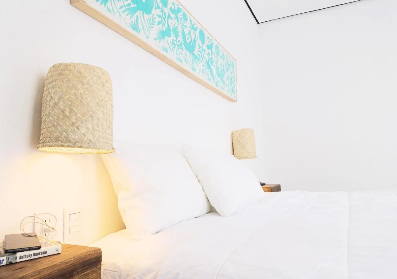 Decorative detail, Bed in Hotel Mamá Carlota