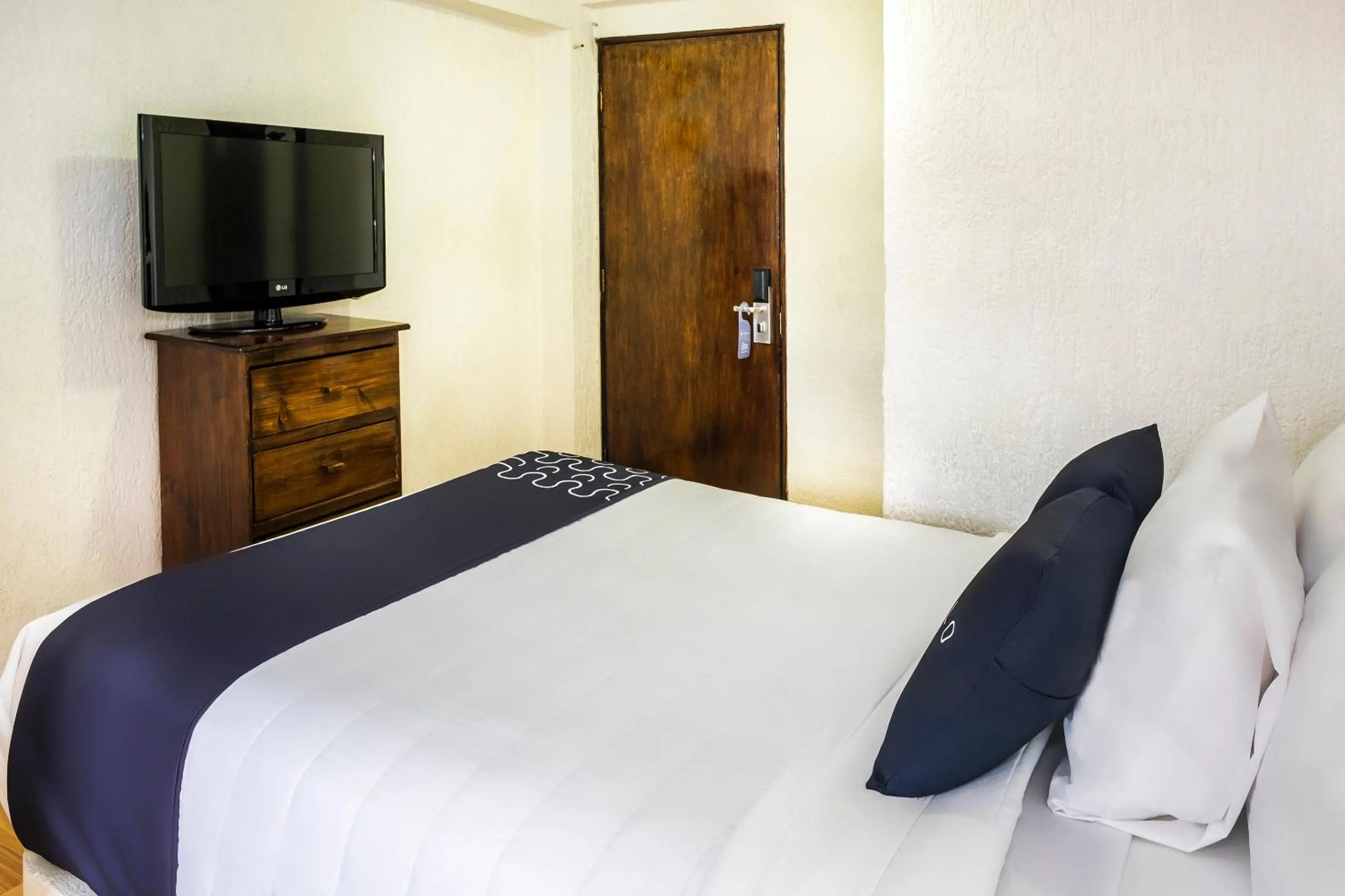 Bedroom, Bed in Capital O Hotel Central, Xalapa