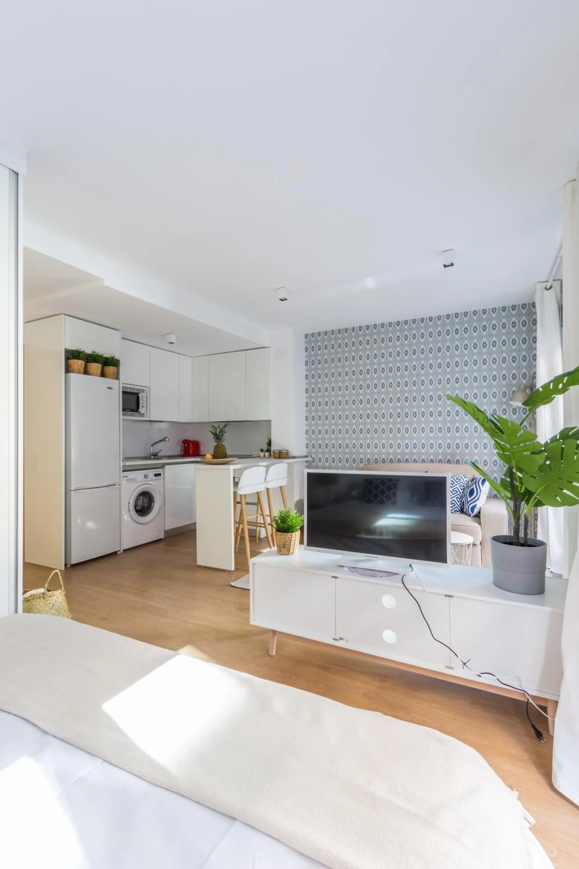 Bed in Horoko Apartments by gaiarooms