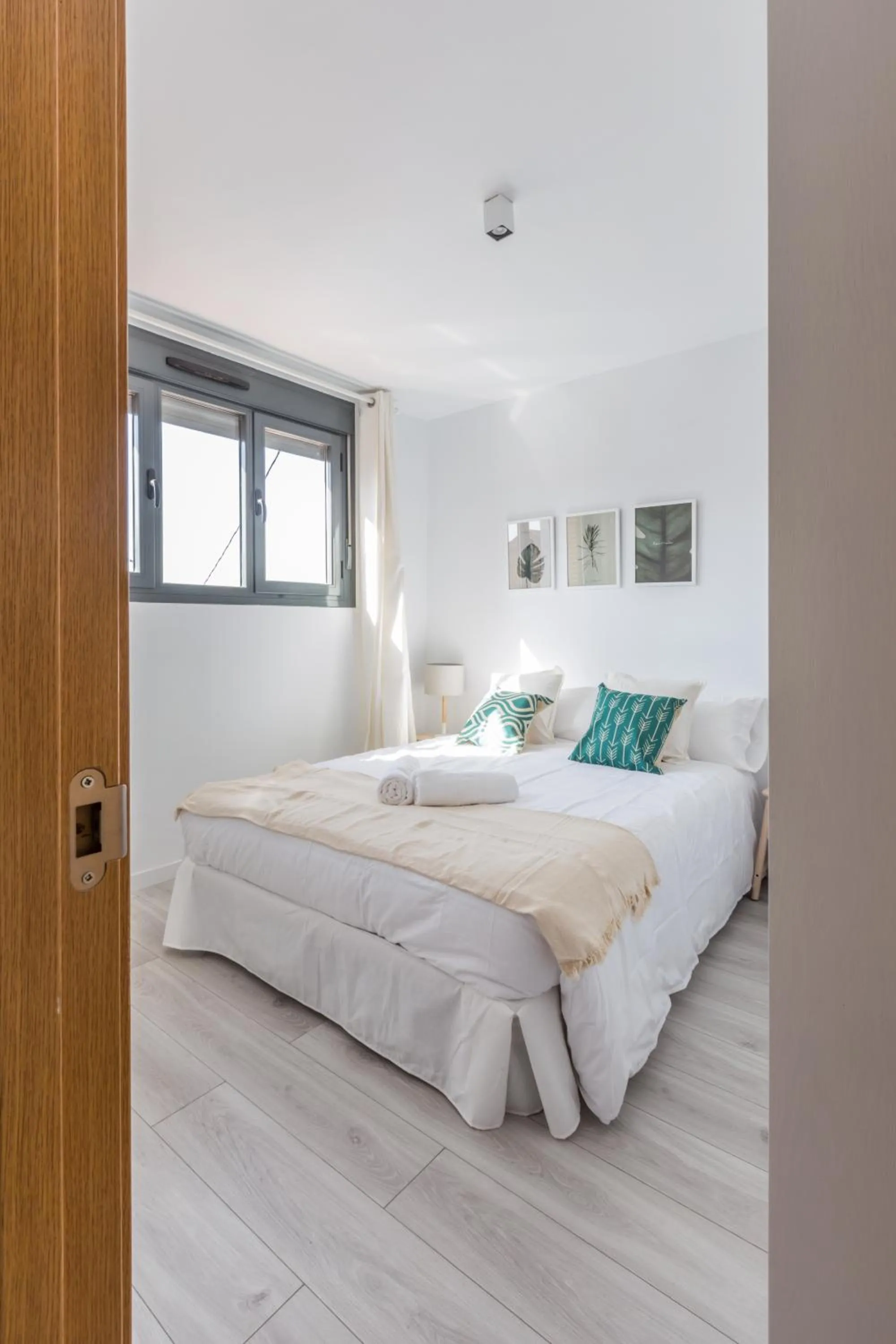 Bed in Horoko Apartments by gaiarooms