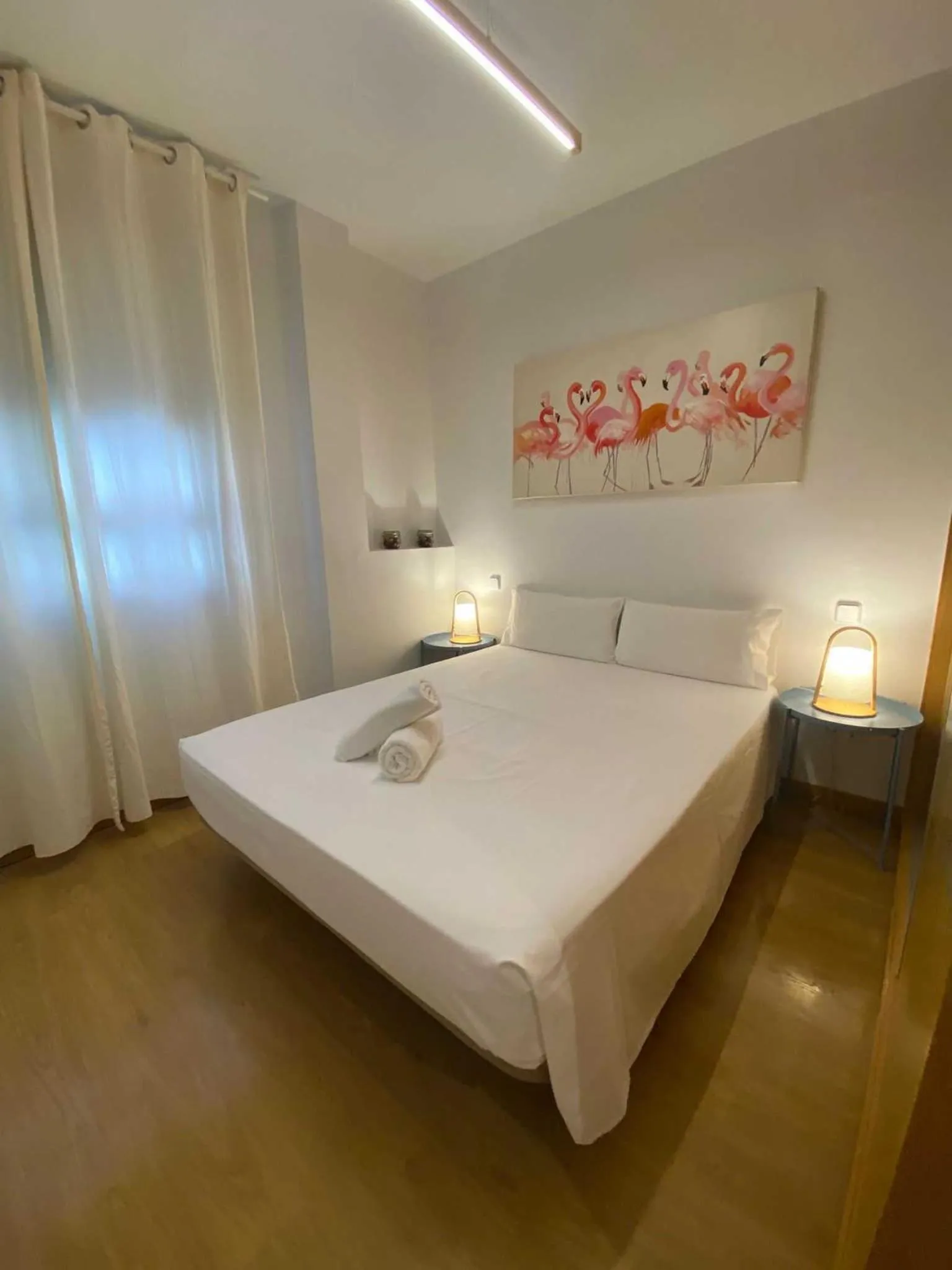 Bed in Horoko Apartments by gaiarooms