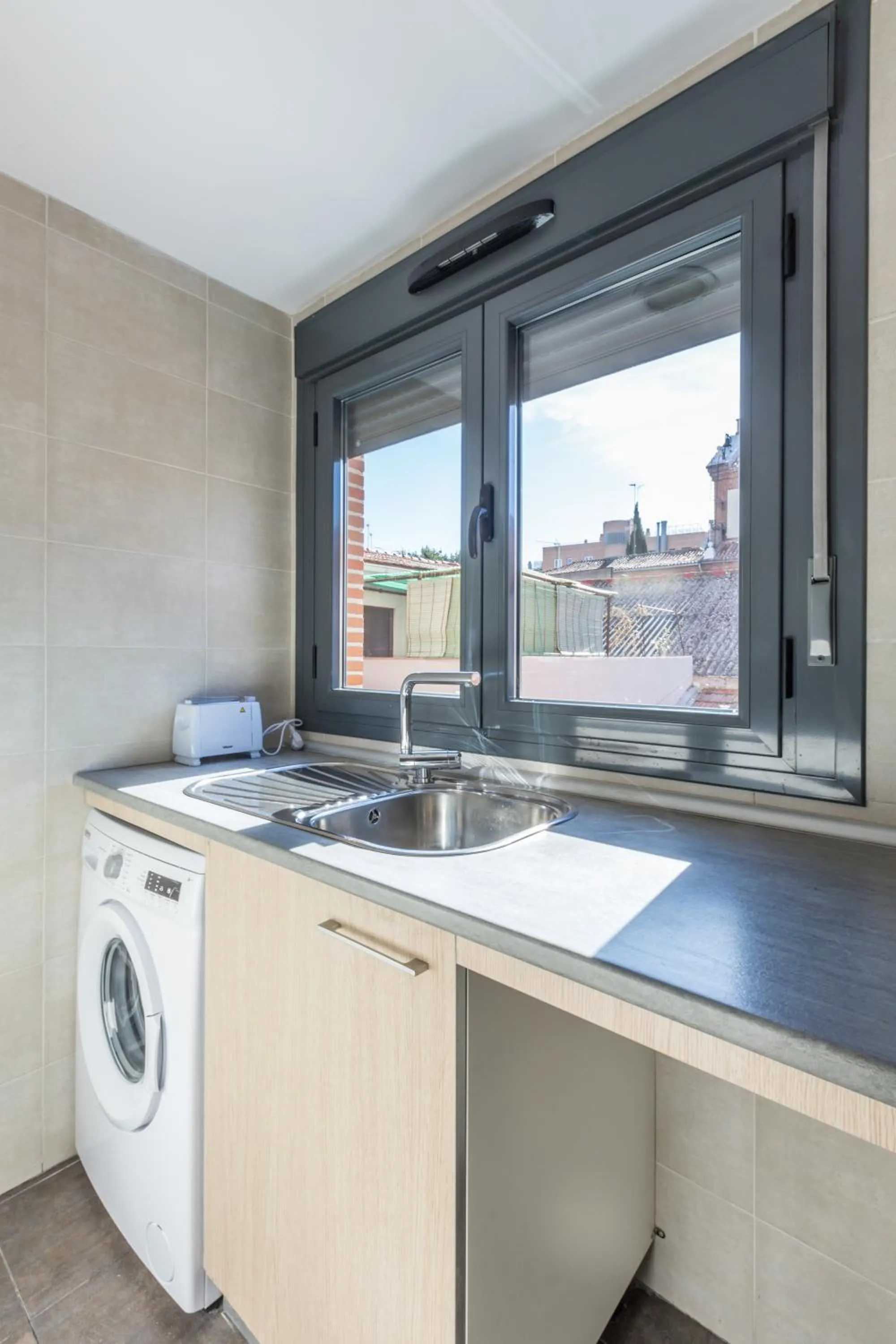 Kitchen or kitchenette in Horoko Apartments by gaiarooms