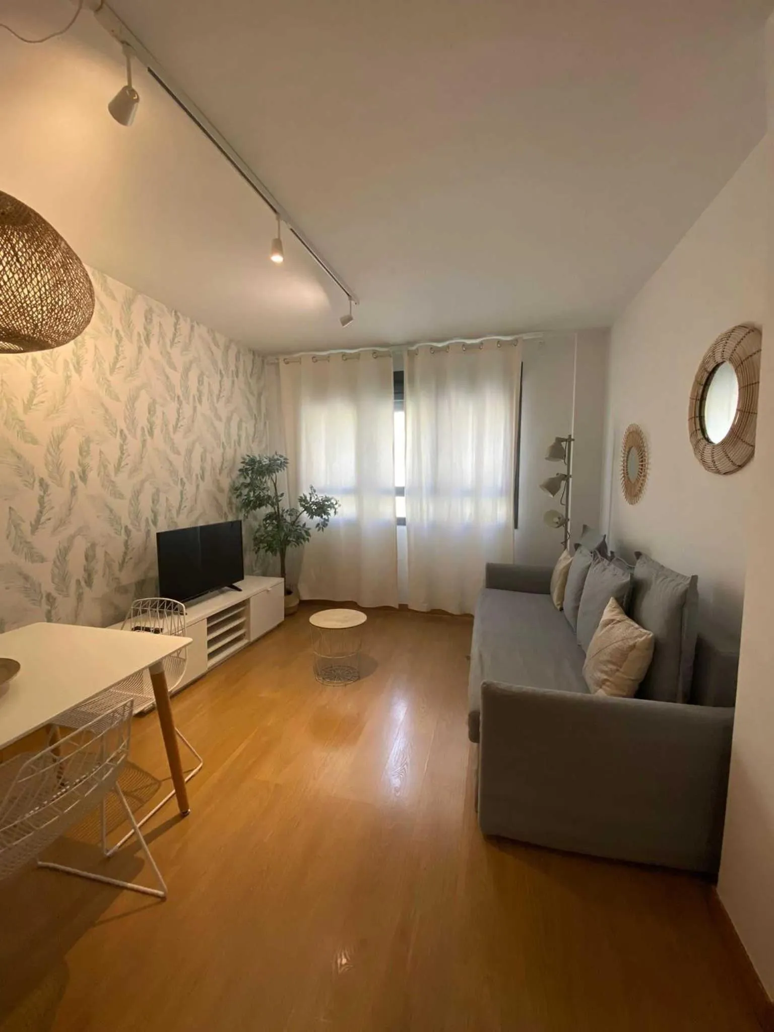 Living room in Horoko Apartments by gaiarooms