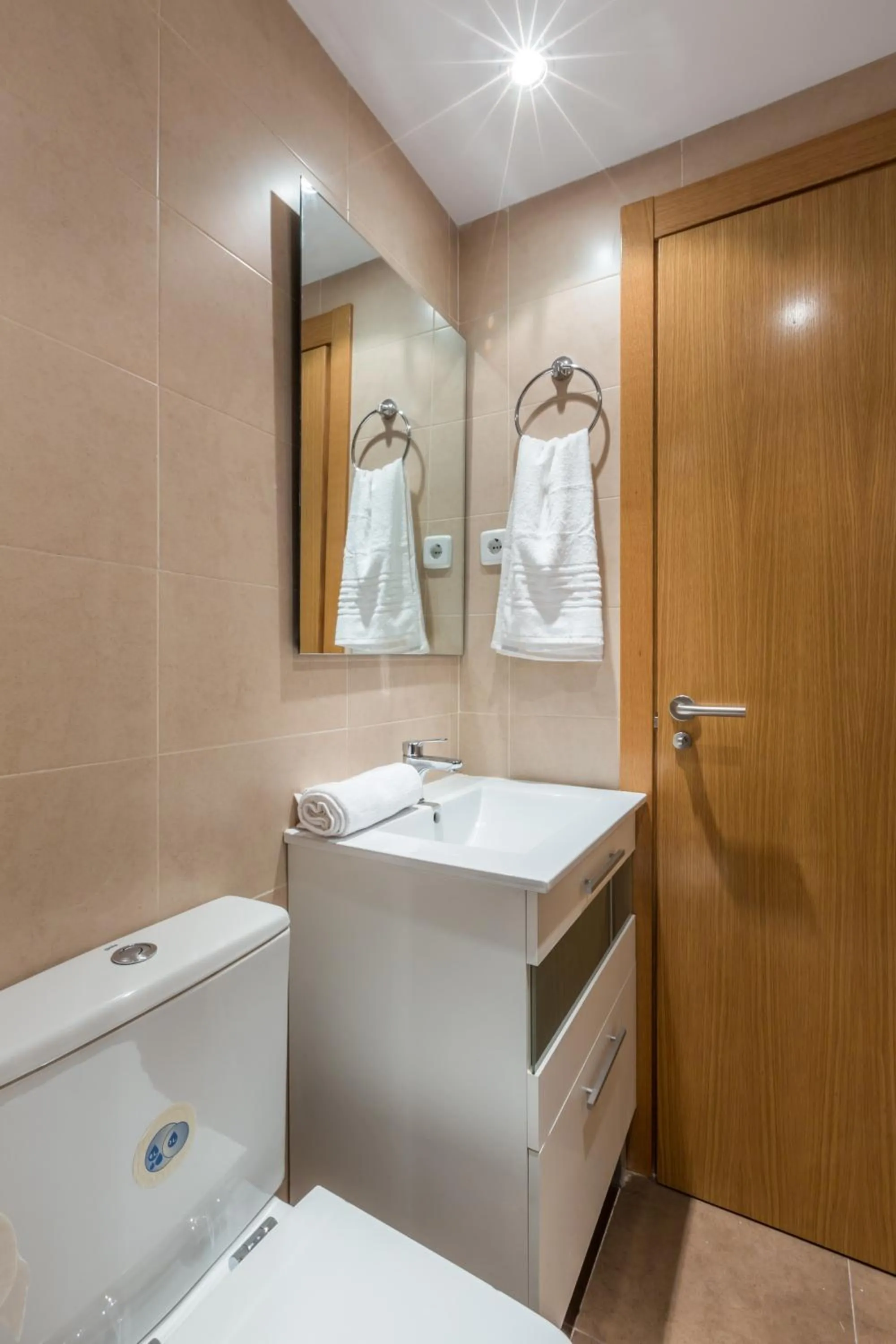 Bathroom in Horoko Apartments by gaiarooms