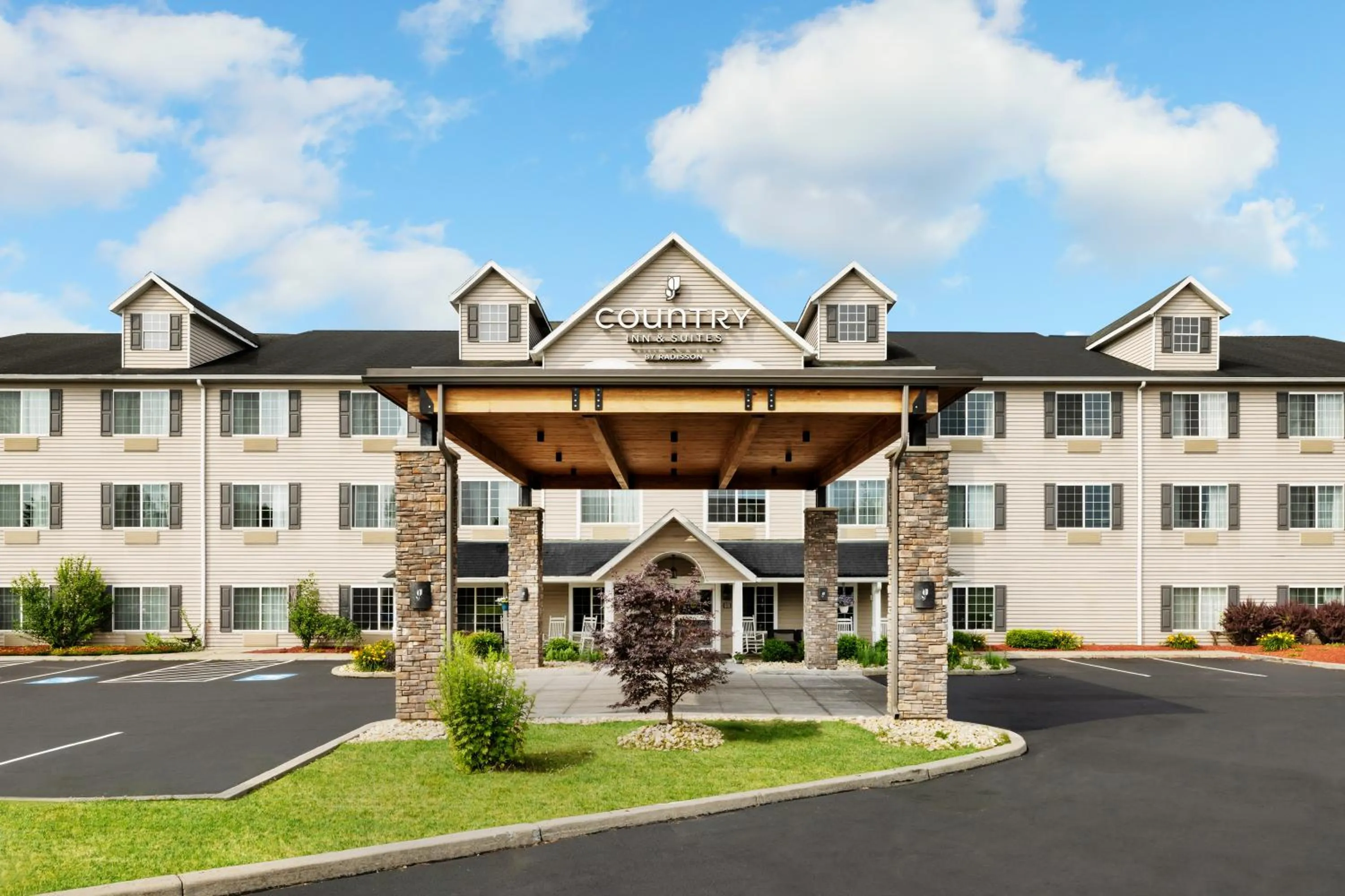 Property building in Country Inn & Suites by Radisson, Big Flats (Elmira), NY