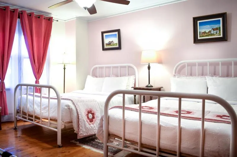 Bed in Complexe d'hébergement la Maison touristique Dugas