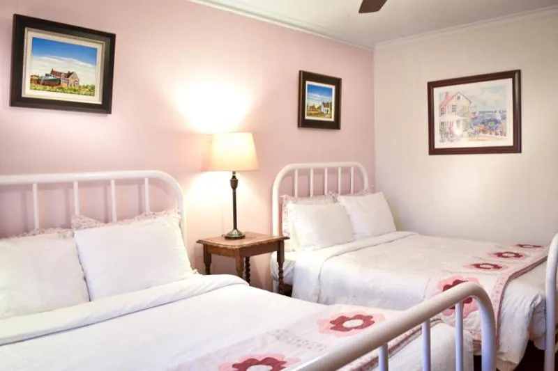 Bed in Complexe d'hébergement la Maison touristique Dugas