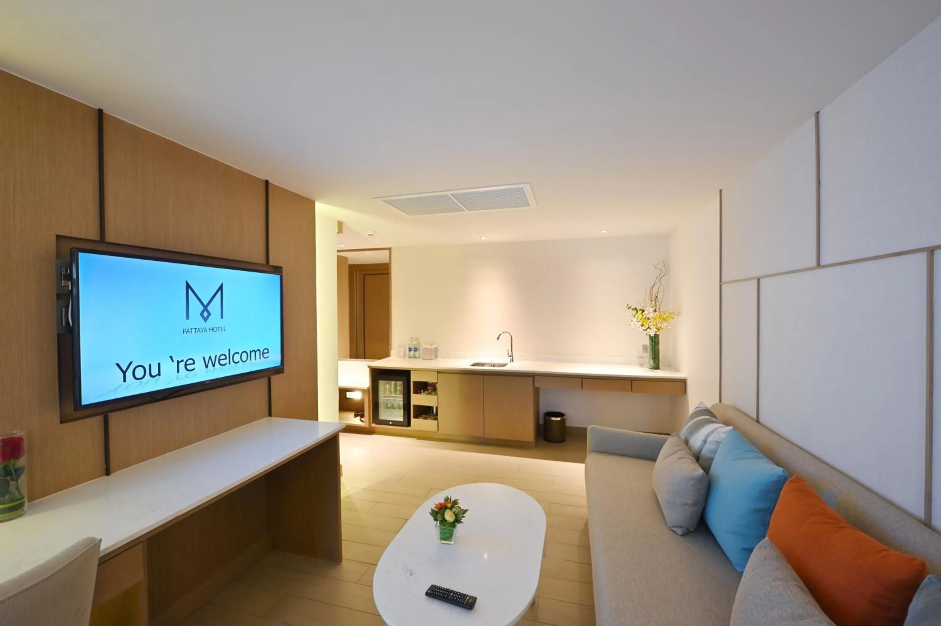 Living room in M Pattaya Hotel - SHA Extra Plus