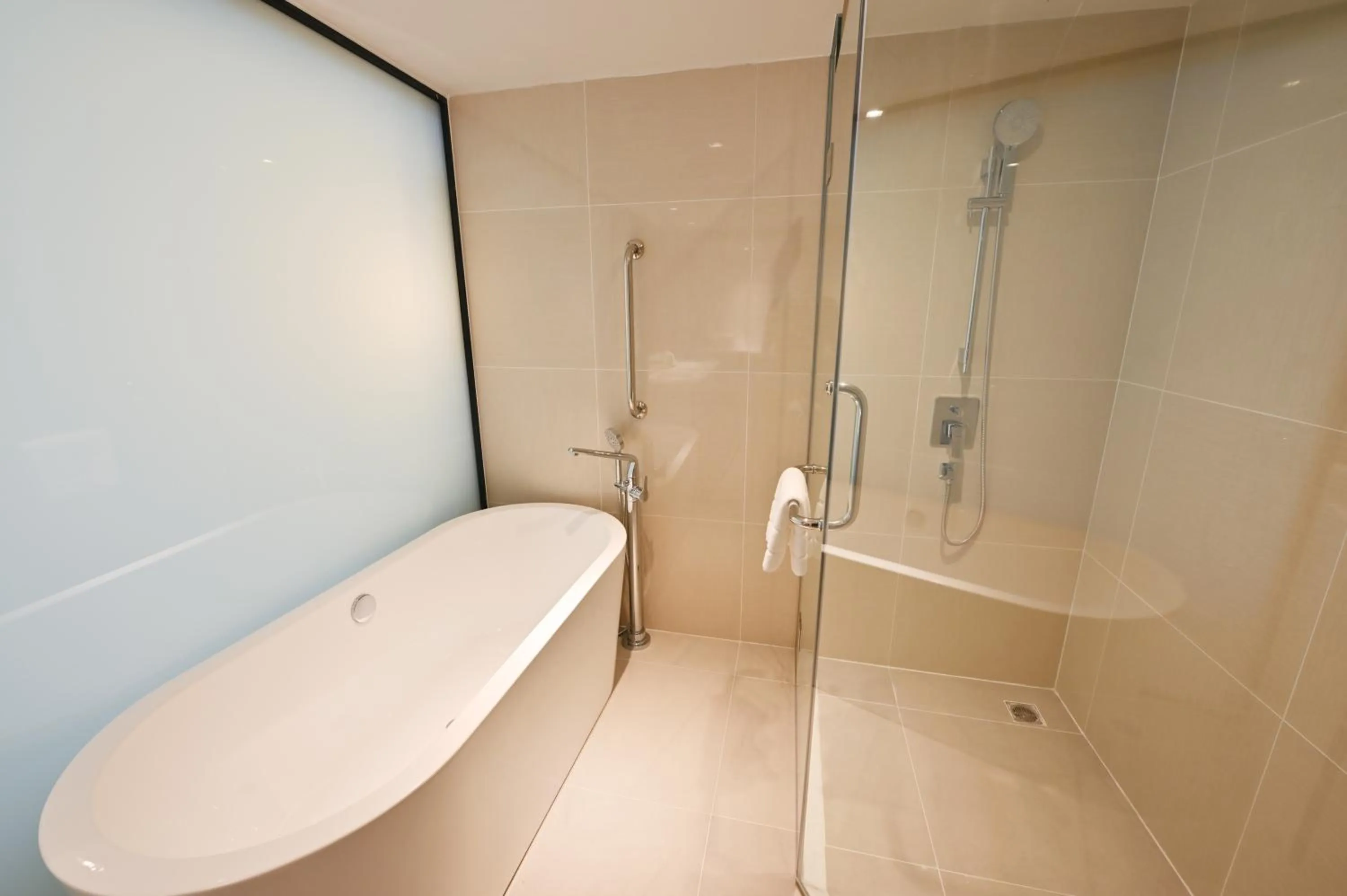 Bathroom in M Pattaya Hotel - SHA Extra Plus