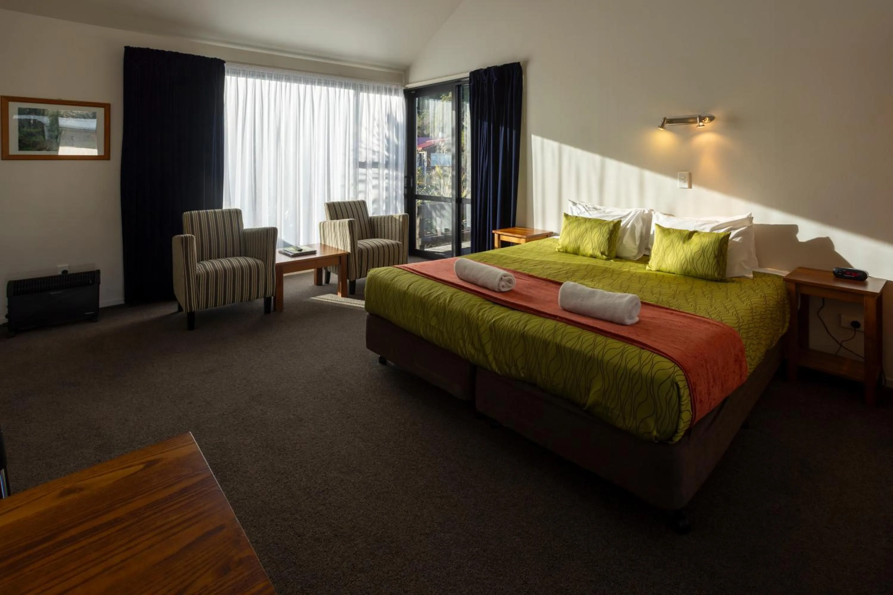 Bed in Alpine Glacier Motel