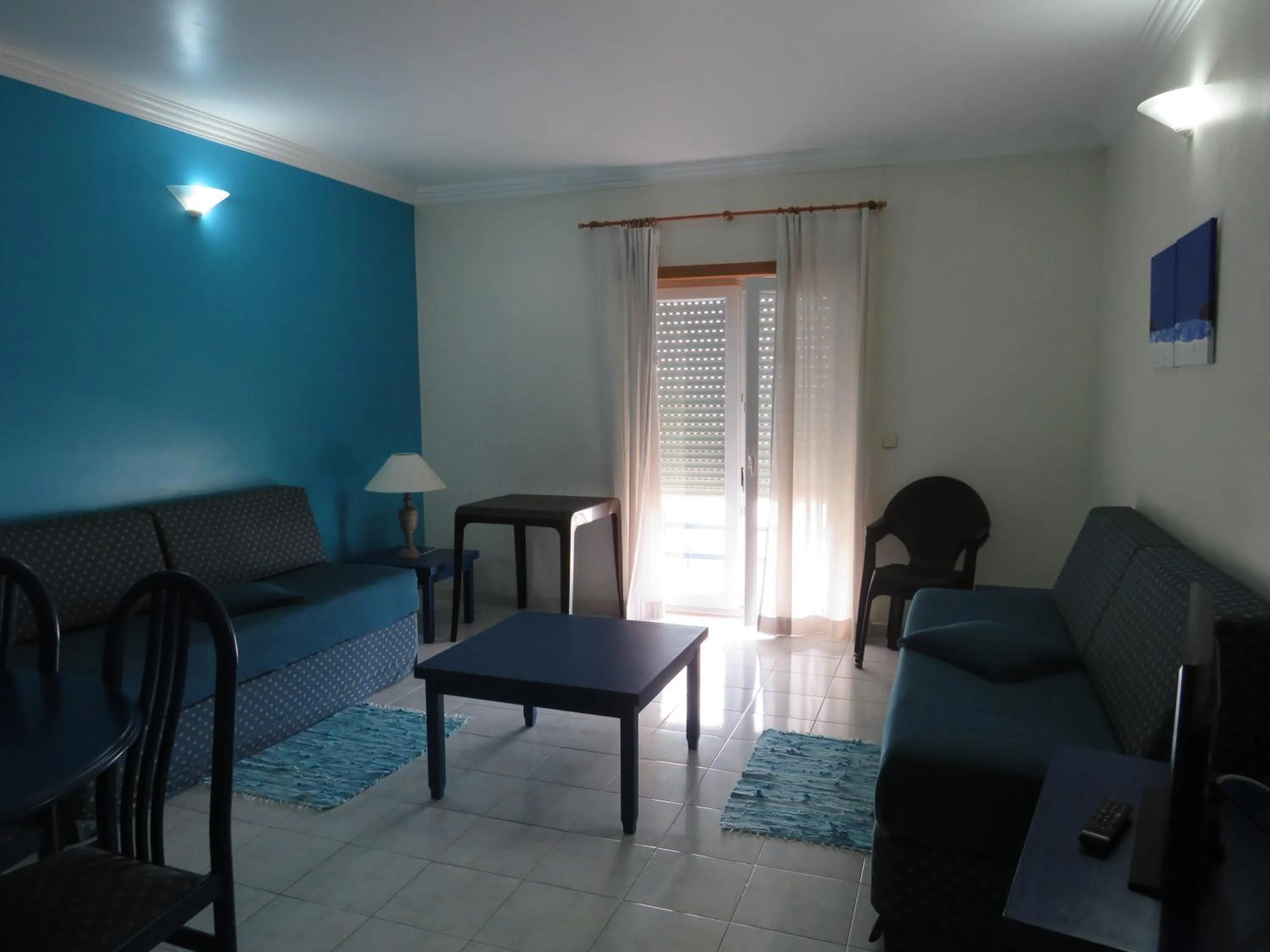 Communal lounge/ TV room in Hotel Apartamento Praia Azul