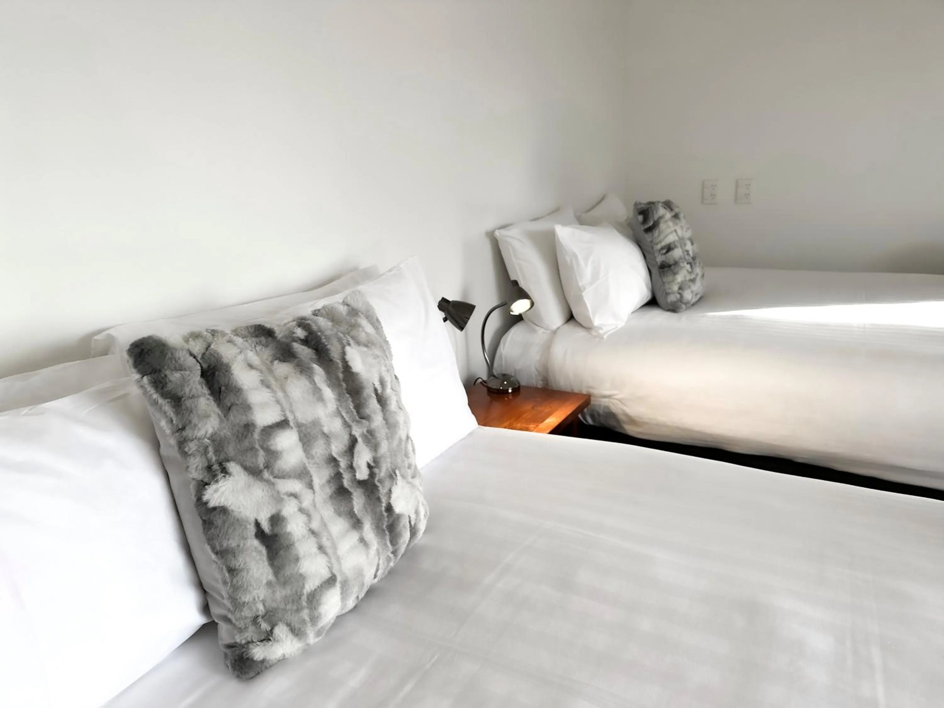 Bed in Delorenzo Studio Apartments