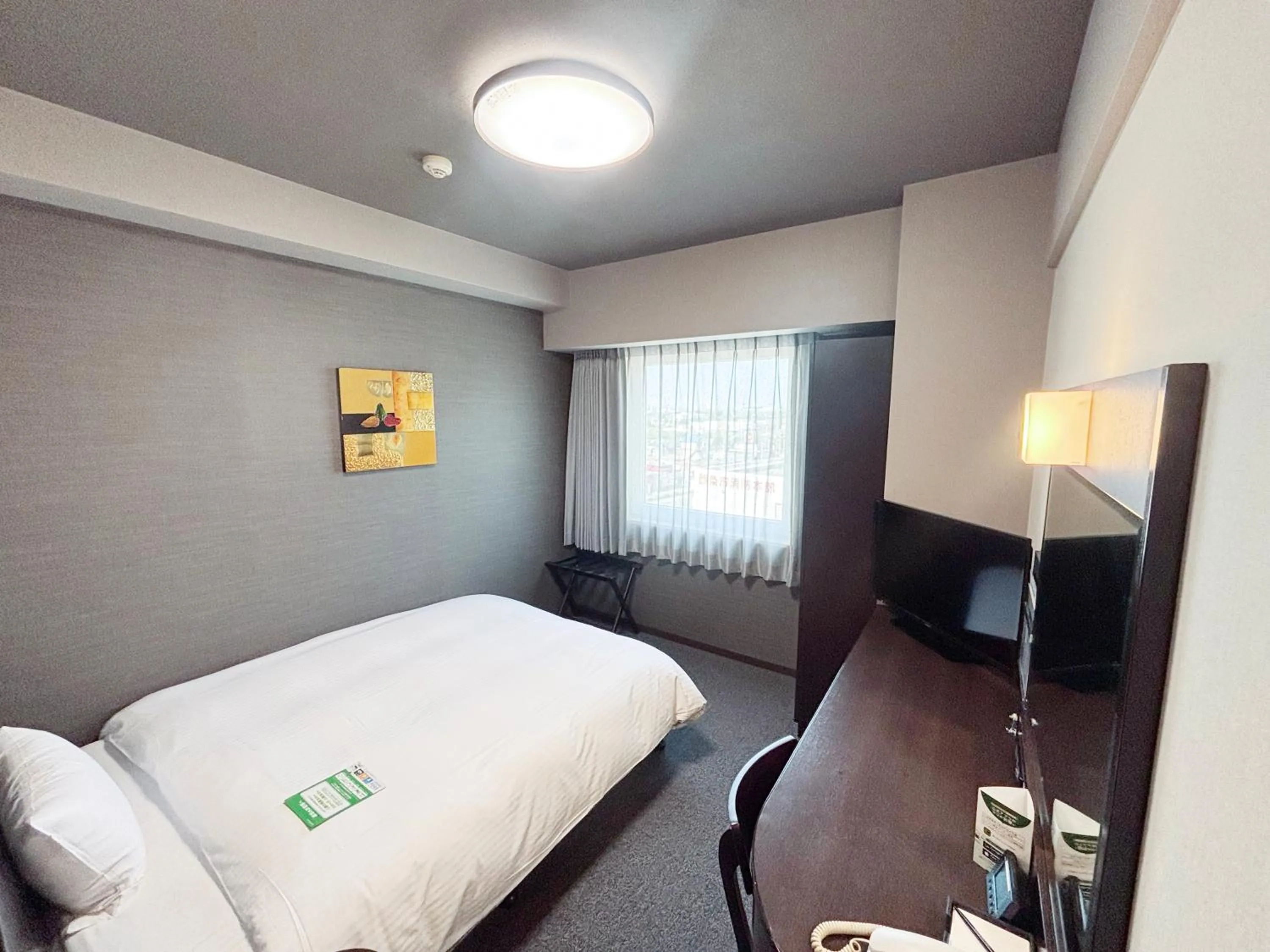 Photo of the whole room, Bed in Hotel Route-Inn Iyo-Saijo