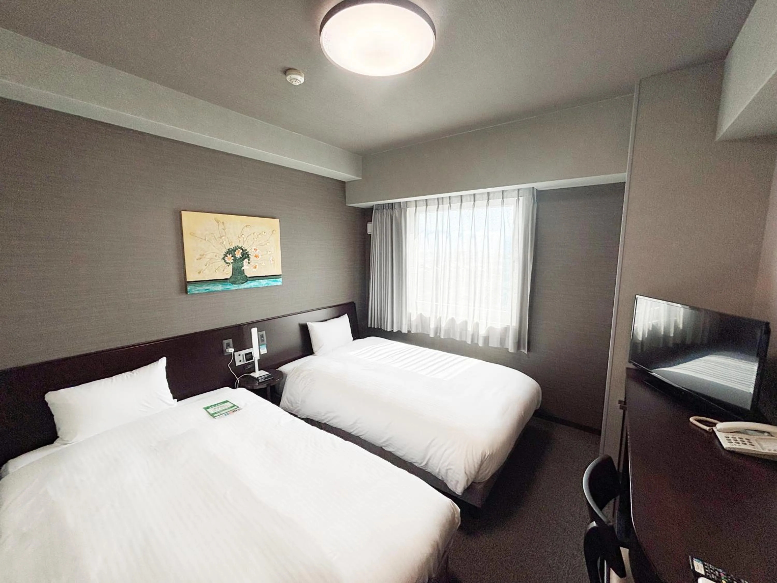 Photo of the whole room, Bed in Hotel Route-Inn Iyo-Saijo