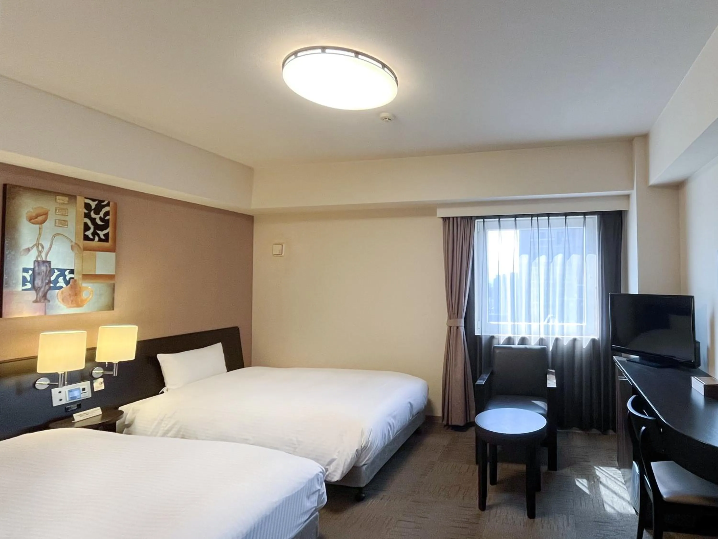 Photo of the whole room, Bed in Hotel Route-Inn Hofu Ekimae